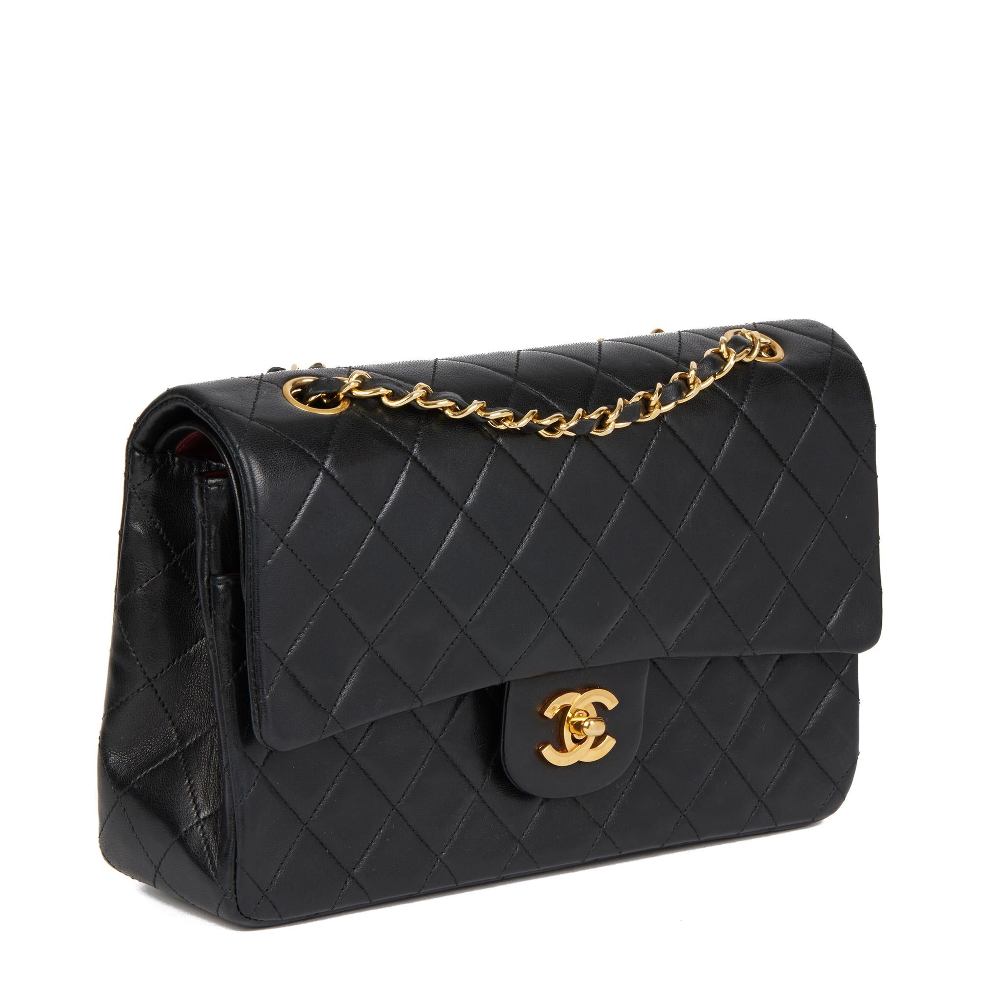 CHANEL
Black Quilted Lambskin Vintage Medium Classic Double Flap Bag

Serial Number: 1515293
Age (Circa): 1990
Accompanied By: Chanel Dust Bag, Box, Authenticity Card (Card Is Damaged)
Authenticity Details: Authenticity Card, Serial Sticker (Made In