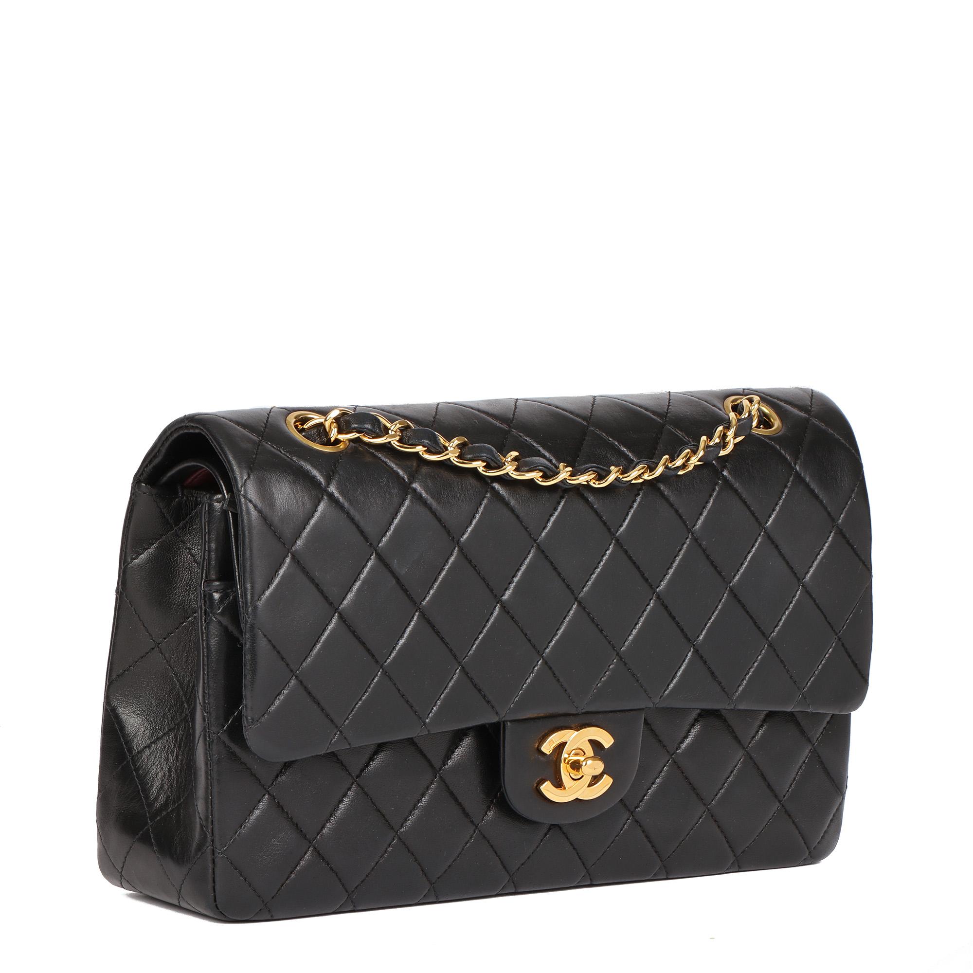 CHANEL
Black Quilted Lambskin Vintage Medium Classic Double Flap Bag

Xupes Reference: HB4577
Serial Number: 5892843
Age (Circa): 1999
Accompanied By: Chanel Dust Bag, Authenticity Card
Authenticity Details: Authenticity Card, Serial Sticker (Made