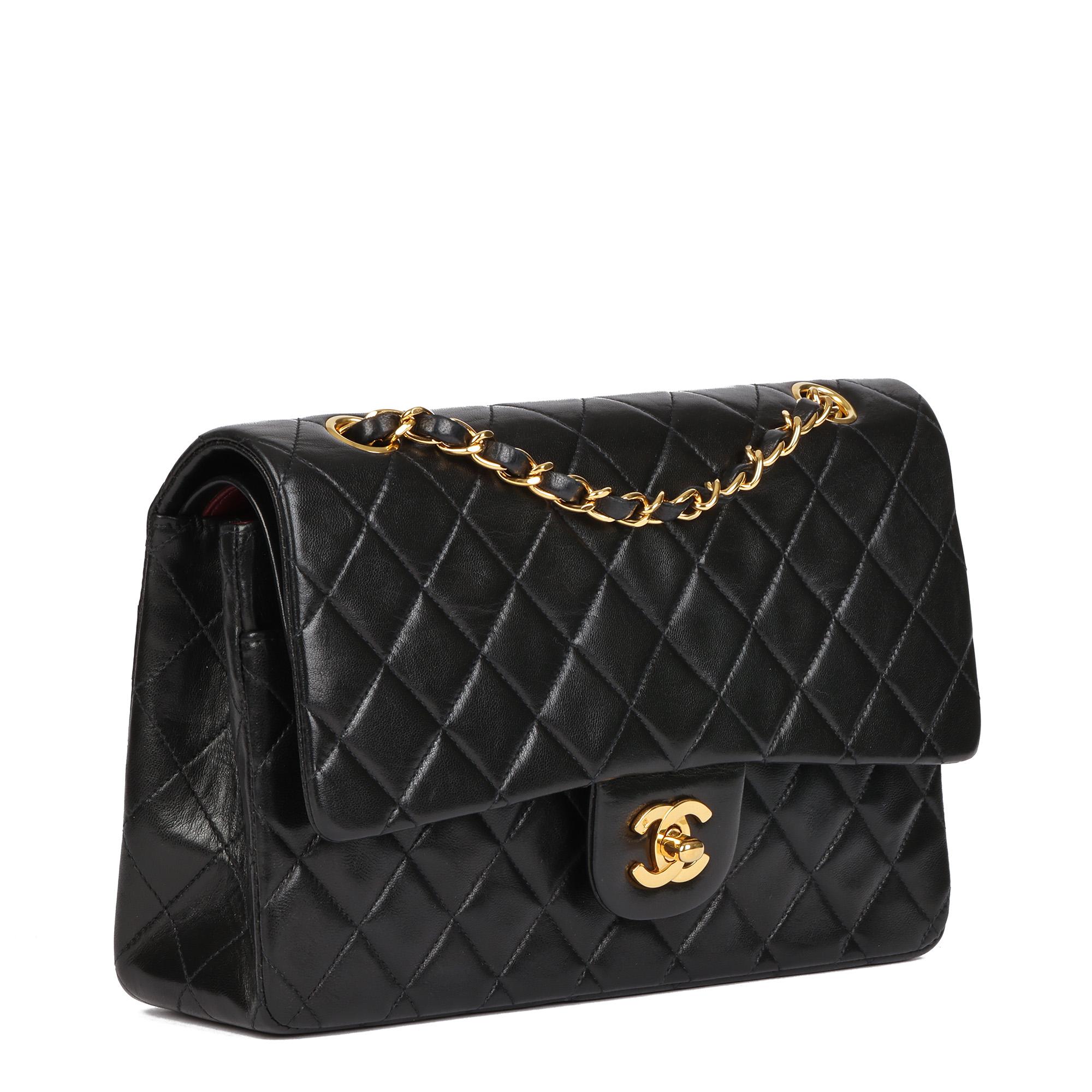CHANEL
Black Quilted Lambskin Vintage Medium Classic Double Flap Bag

Xupes Reference: HB4581
Serial Number: 2408174
Age (Circa): 1992
Accompanied By: Chanel Dust Bag, Authenticity Card, Protective Felt
Authenticity Details: Authenticity Card,