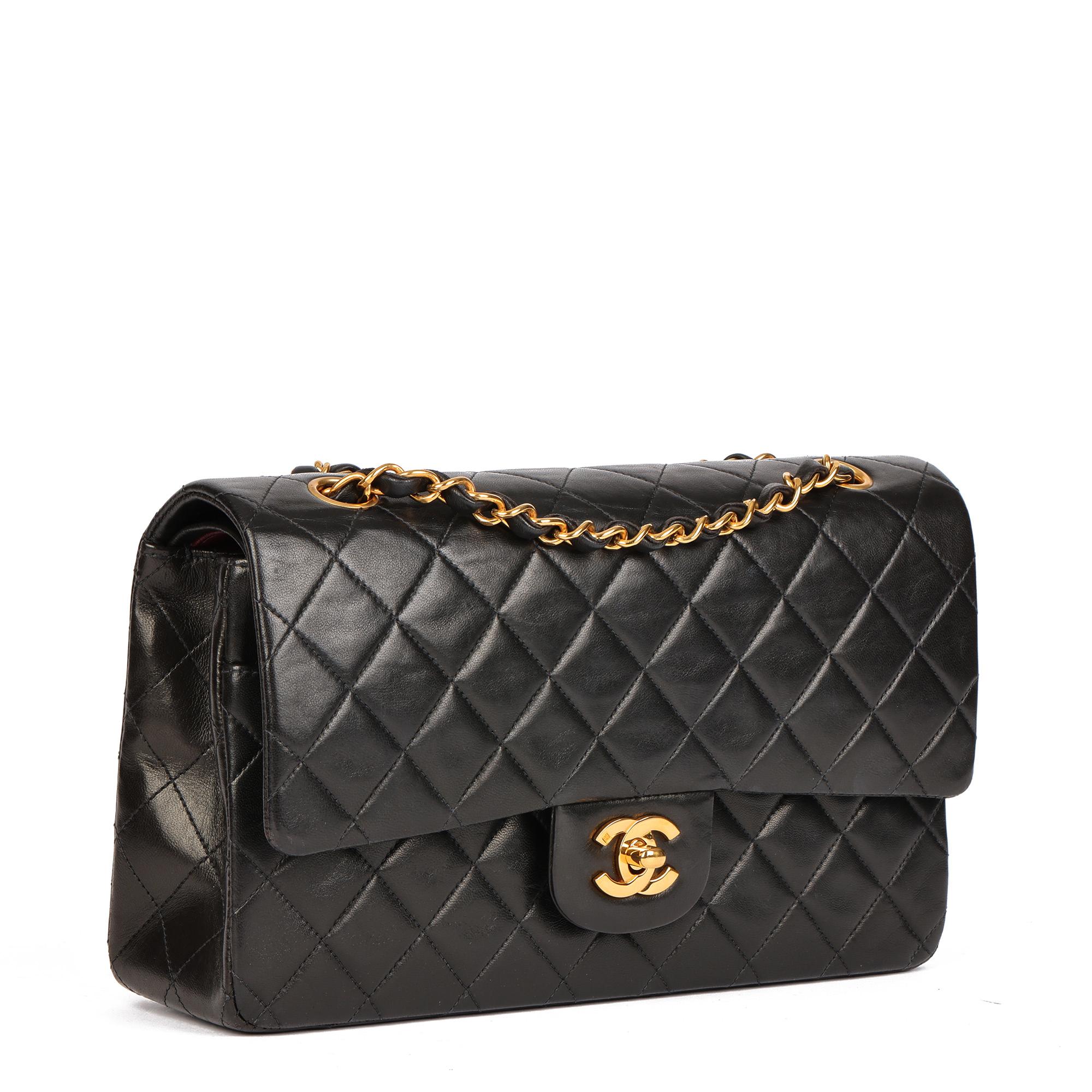 CHANEL
Black Quilted Lambskin Vintage Medium Classic Double Flap Bag 

Xupes Reference: HB4601
Serial Number: 3941336
Age (Circa): 1996
Authenticity Details: Serial Sticker (Made in France)
Gender: Ladies
Type: Shoulder

Colour: Black
Hardware: Gold
