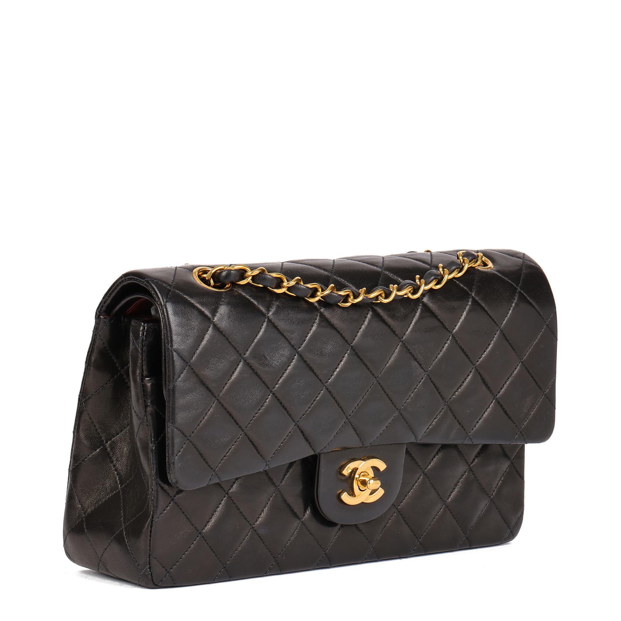 CHANEL
Black Quilted Lambskin Vintage Medium Classic Double Flap Bag 

Serial Number: 3227250
Age (Circa): 1994
Accompanied By: Chanel Dust Bag
Authenticity Details: Serial Sticker (Made in France)
Gender: Ladies
Type: Shoulder

Colour:
