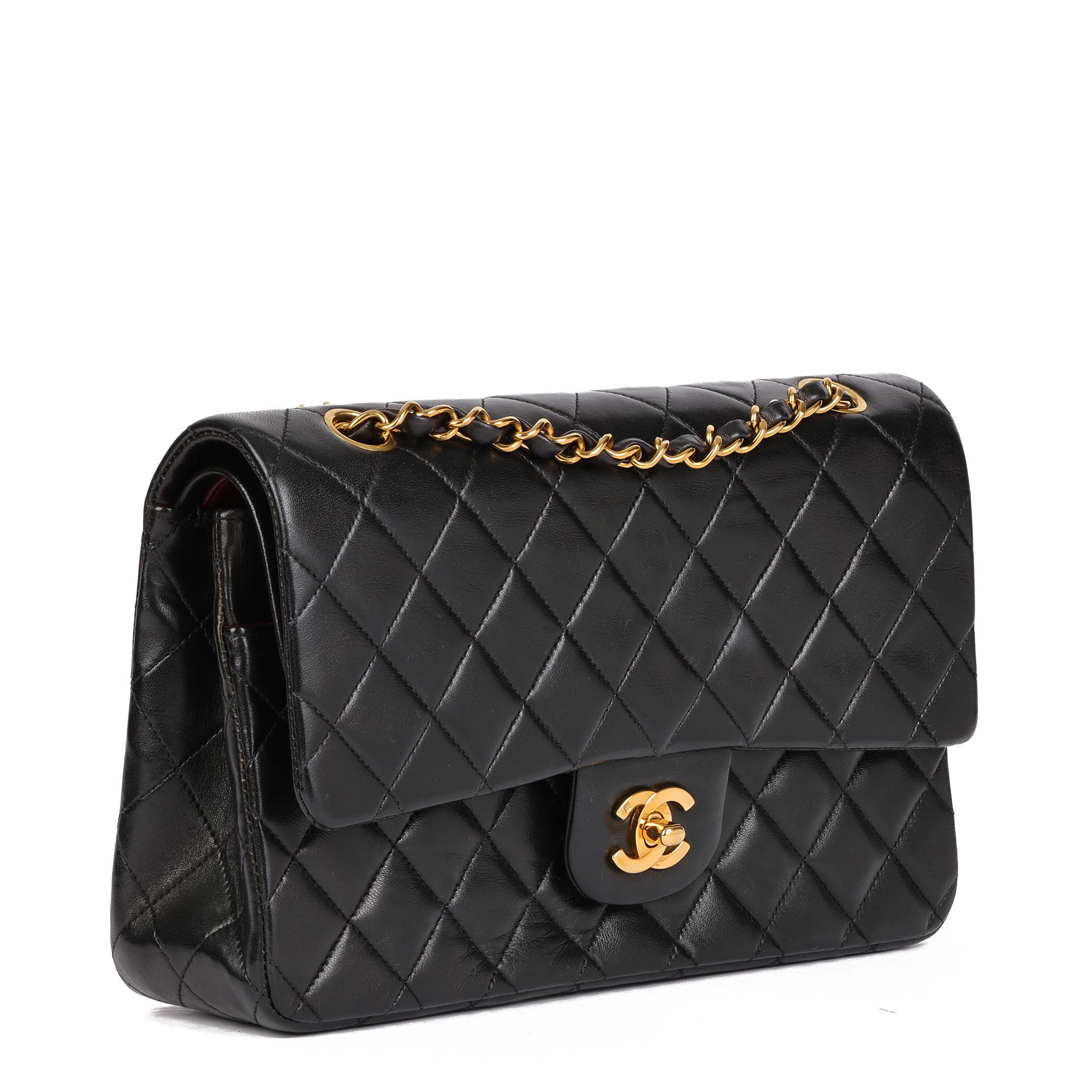 CHANEL
Black Quilted Lambskin Vintage Medium Classic Double Flap Bag 

Serial Number: 2864799
Age (Circa): 1993
Accompanied By: Chanel Dust Bag
Authenticity Details: Serial Sticker (Made in France)
Gender: Ladies
Type: Shoulder

Colour: