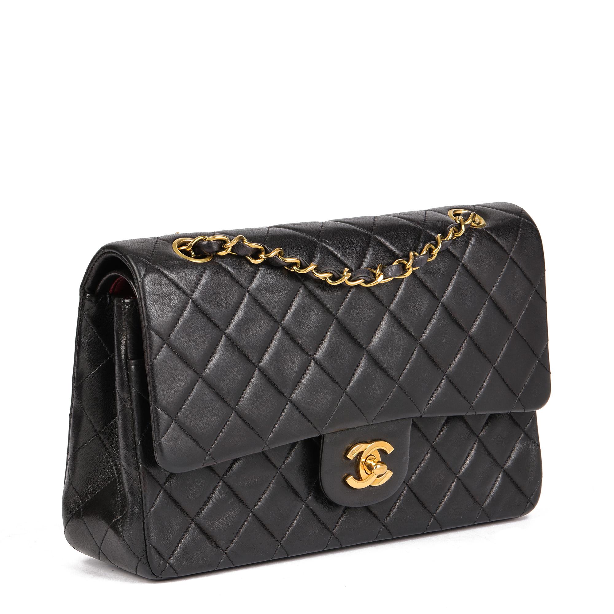CHANEL
Black Quilted Lambskin Vintage Medium Classic Double Flap Bag 

Serial Number: 2855380
Age (Circa): 1993
Accompanied By: Chanel Dust Bag, Authenticity Card
Authenticity Details: Authenticity Card, Serial Sticker (Made in France)
Gender: