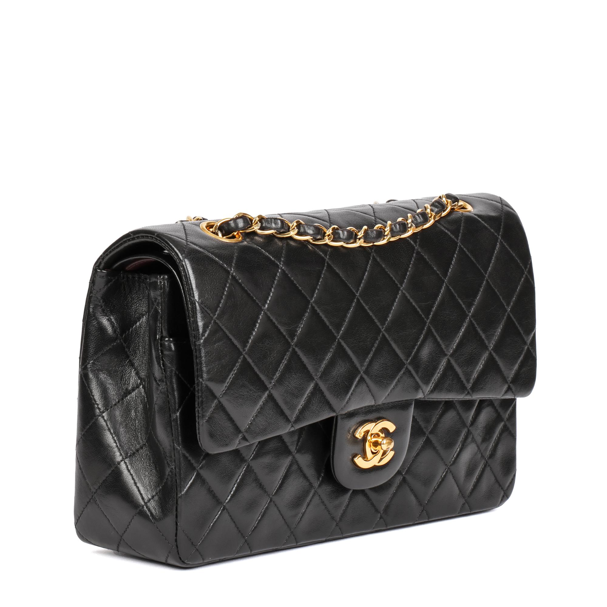 CHANEL
Black Quilted Lambskin Vintage Medium Classic Double Flap Bag 

Serial Number: 4815038
Age (Circa): 1997
Accompanied By: Chanel Dust Bag, Authenticity Card
Authenticity Details: Authenticity Card, Serial Sticker (Made in France)
Gender: