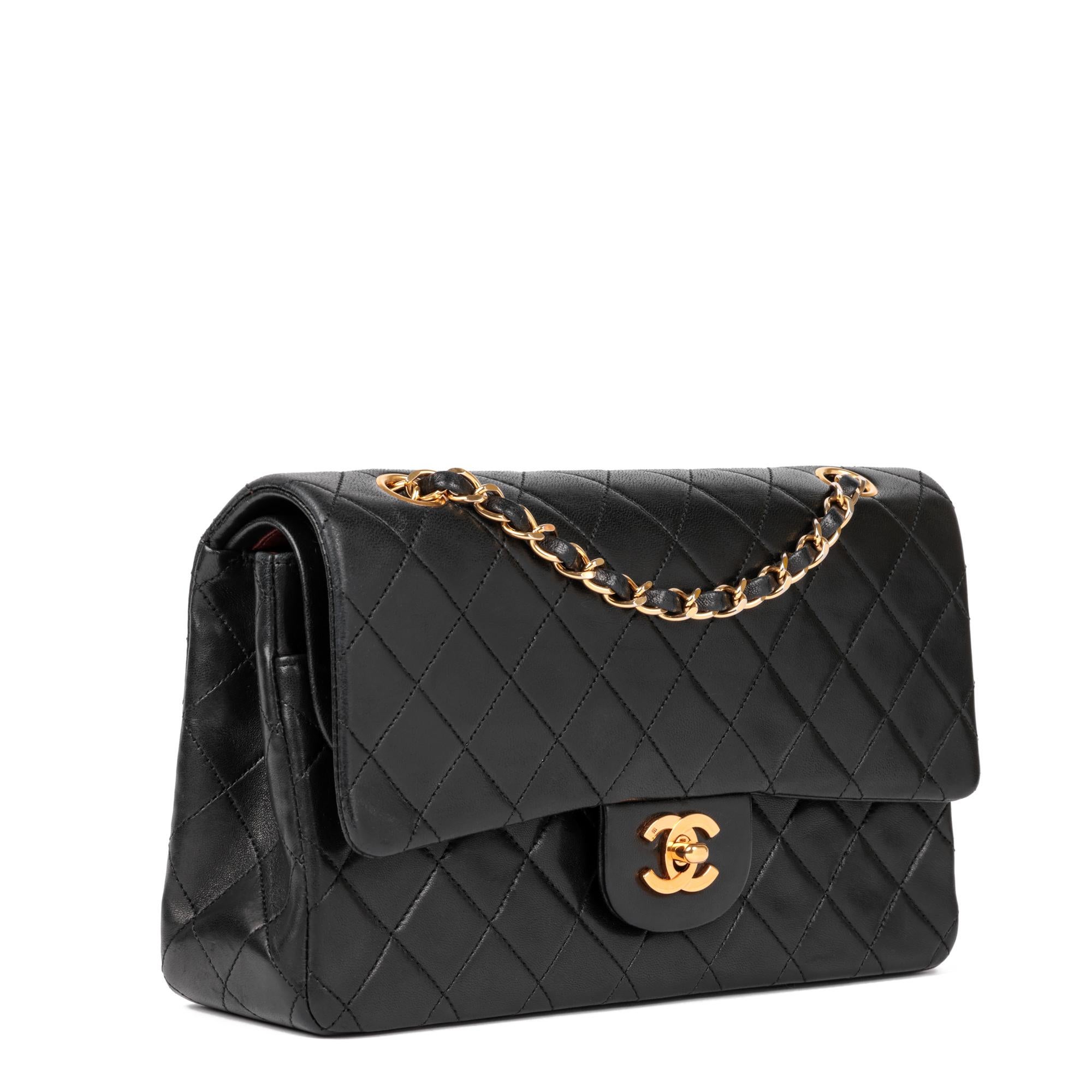 CHANEL
Black Quilted Lambskin Vintage Medium Classic Double Flap Bag

Xupes Reference: CB890
Serial Number: 1447607
Age (Circa): 1990
Accompanied By: Chanel Dust Bag 
Authenticity Details: Serial Sticker (Made in France)
Gender: Ladies
Type: