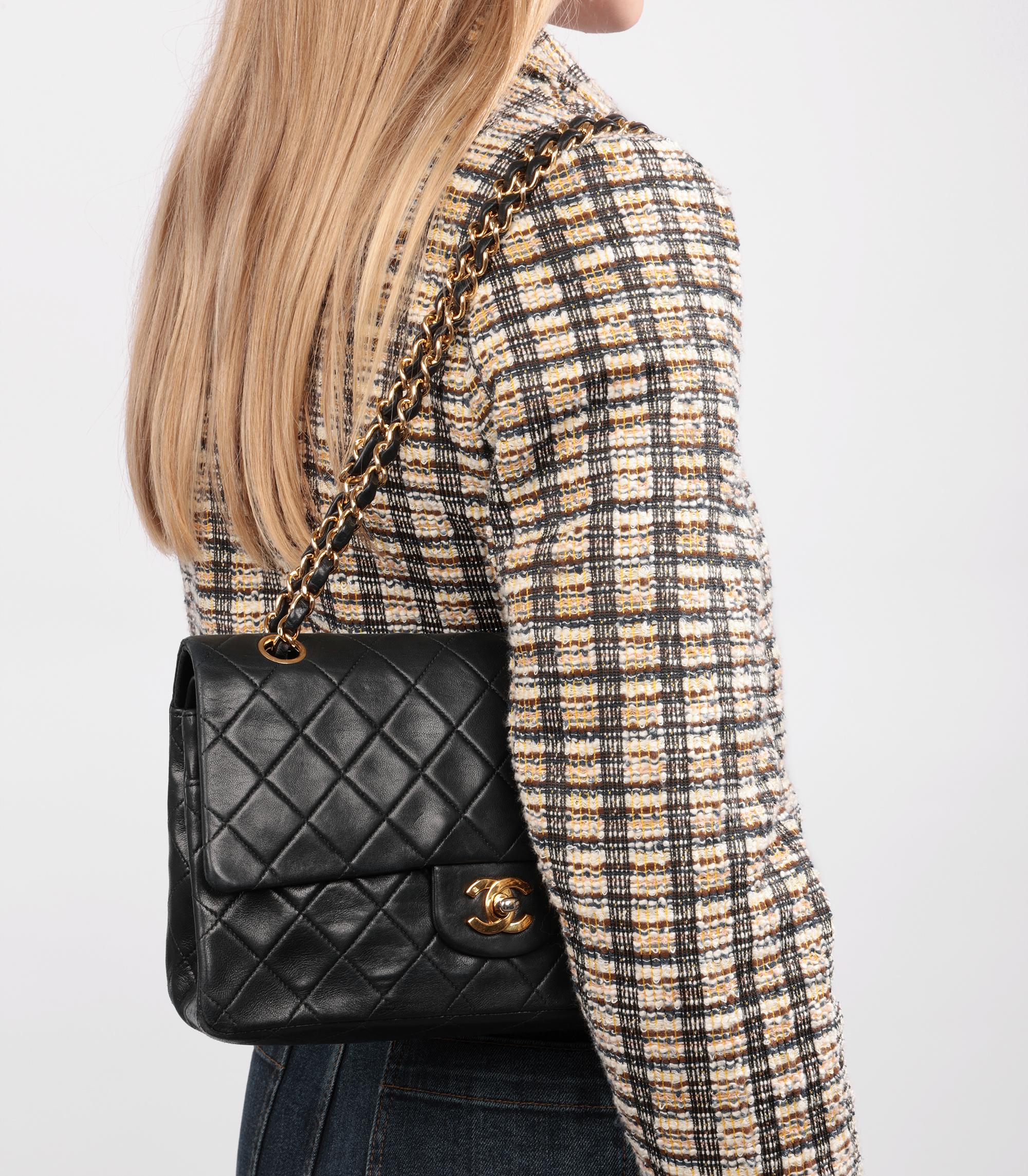 Chanel Black Quilted Lambskin Vintage Medium Classic Double Flap Bag

Brand- Chanel
Model- Medium Classic Double Flap Bag
Product Type- Shoulder
Serial Number- 2009691
Age- Circa 1991
Accompanied By- Chanel Dust Bag, Box
Colour- Black
Hardware- Gold