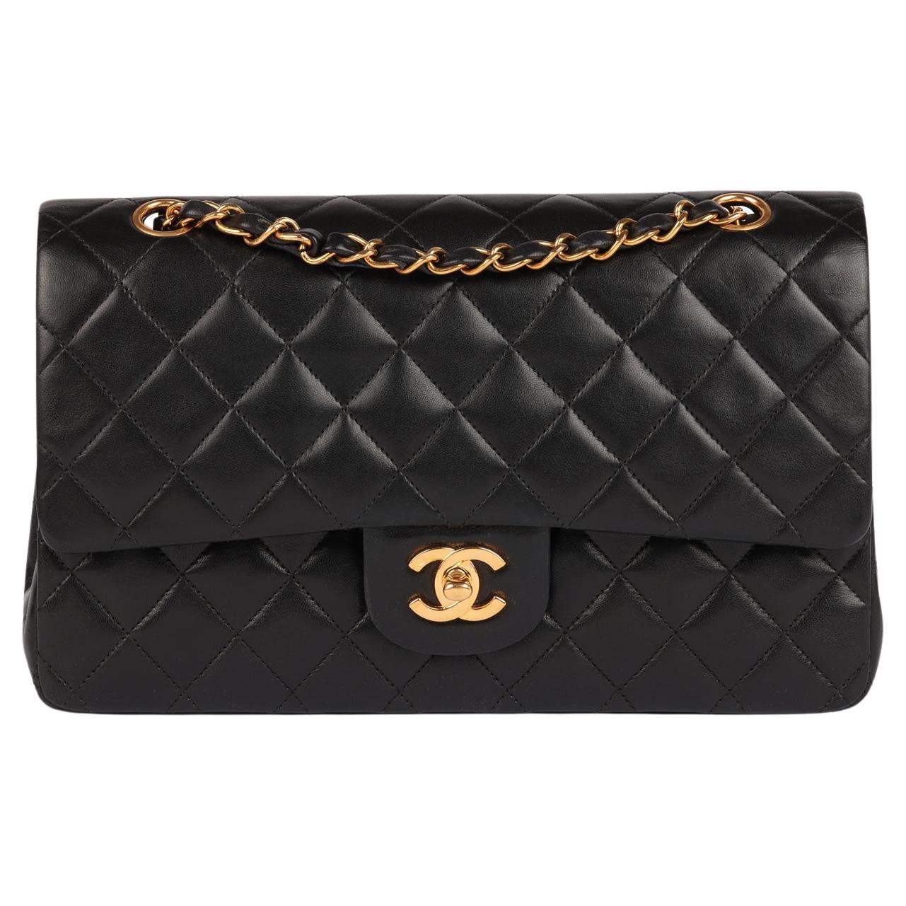 Chanel Black Quilted Lambskin Vintage Medium Classic Double Flap Bag

Product Details
Xupes Ref: HB5928
Brand: Chanel
Model: Medium Classic Double Flap Bag
Type: Shoulder
Serial Number: 7144399
Age: 2002
RRP: £8,850
Accompanied By: Chanel Dust Bag,