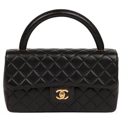 CHANEL Black Quilted Lambskin Vintage Medium Classic Kelly Flap Bag