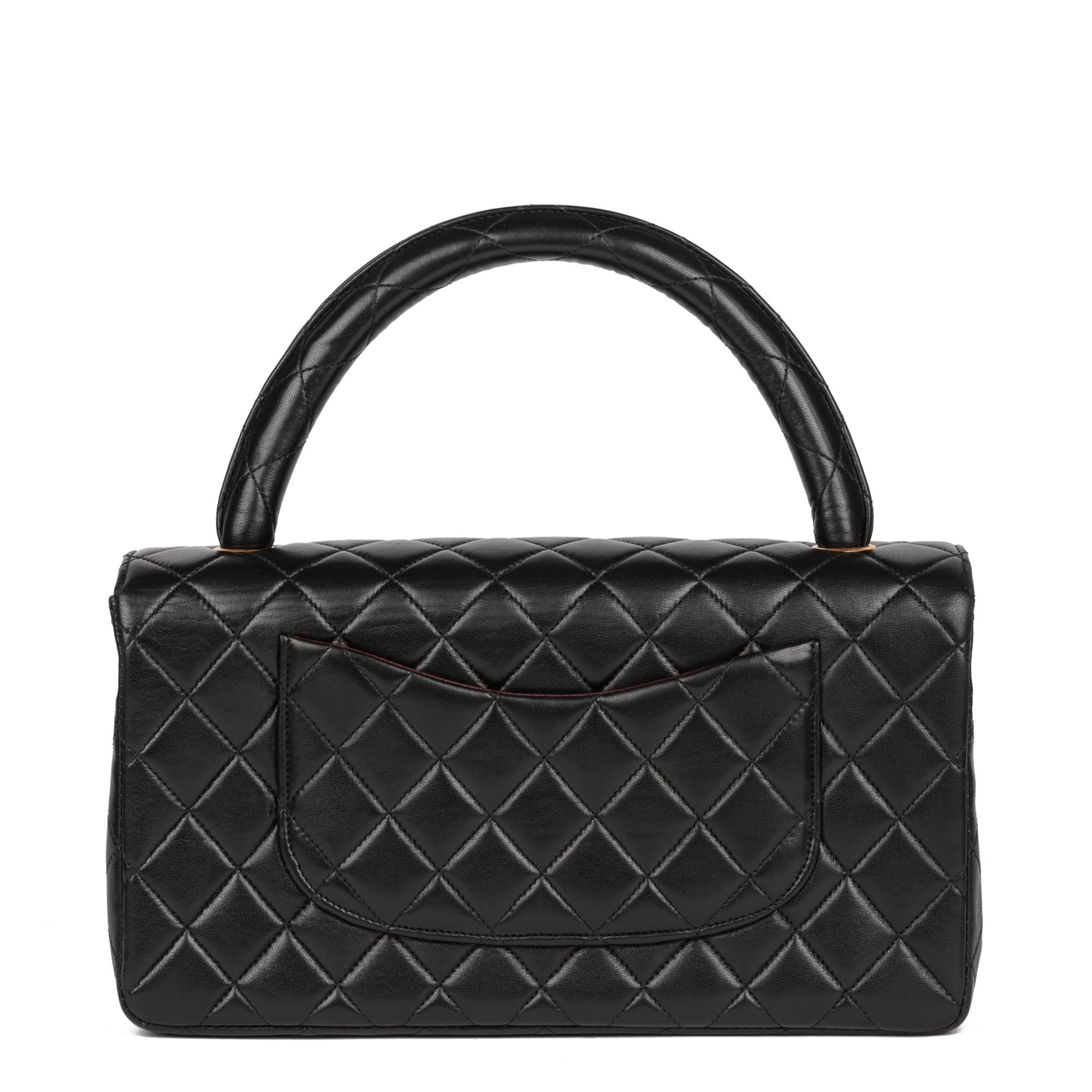 CHANEL Noir Cuir d'agneau matelassé Vintage Medium Classic Kelly en vente 1