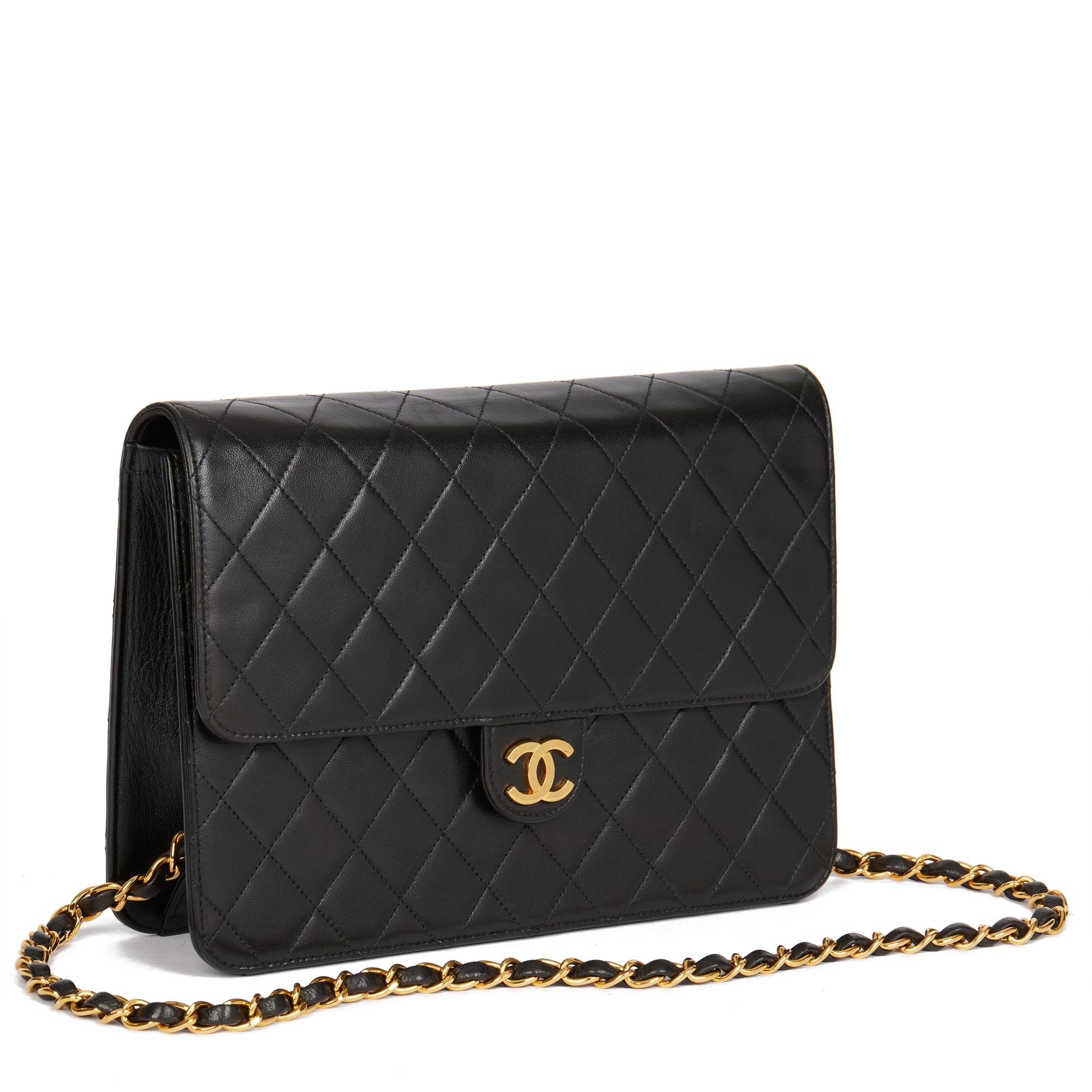 CHANEL
Black Quilted Lambskin Vintage Medium Classic Single Flap Bag

Xupes Reference: HB4646
Serial Number: 5144668
Age (Circa): 1997
Accompanied By: Chanel Dust Bag, Authenticity Card, Care Booklet
Authenticity Details: Authenticity Card, Serial