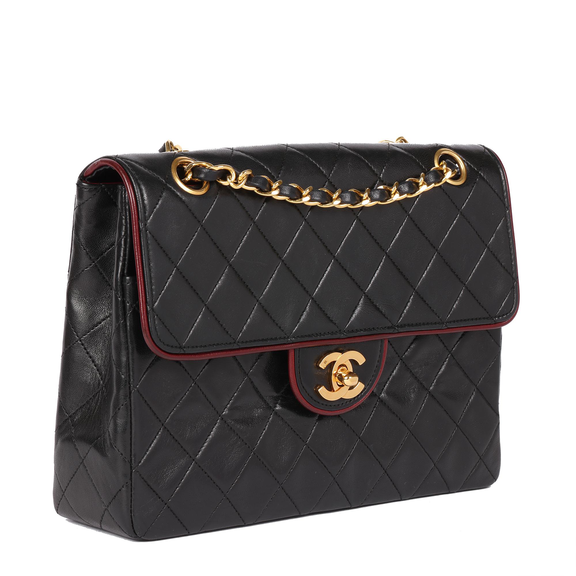 CHANEL
Black Quilted Lambskin Vintage Medium Classic Single Flap Bag with Red Trim

Serial Number: 1354574
Age (Circa): 1990
Accompanied By: Chanel Dust Bag, Authenticity Card 
Authenticity Details: Authenticity Card, Serial Sticker (Made in