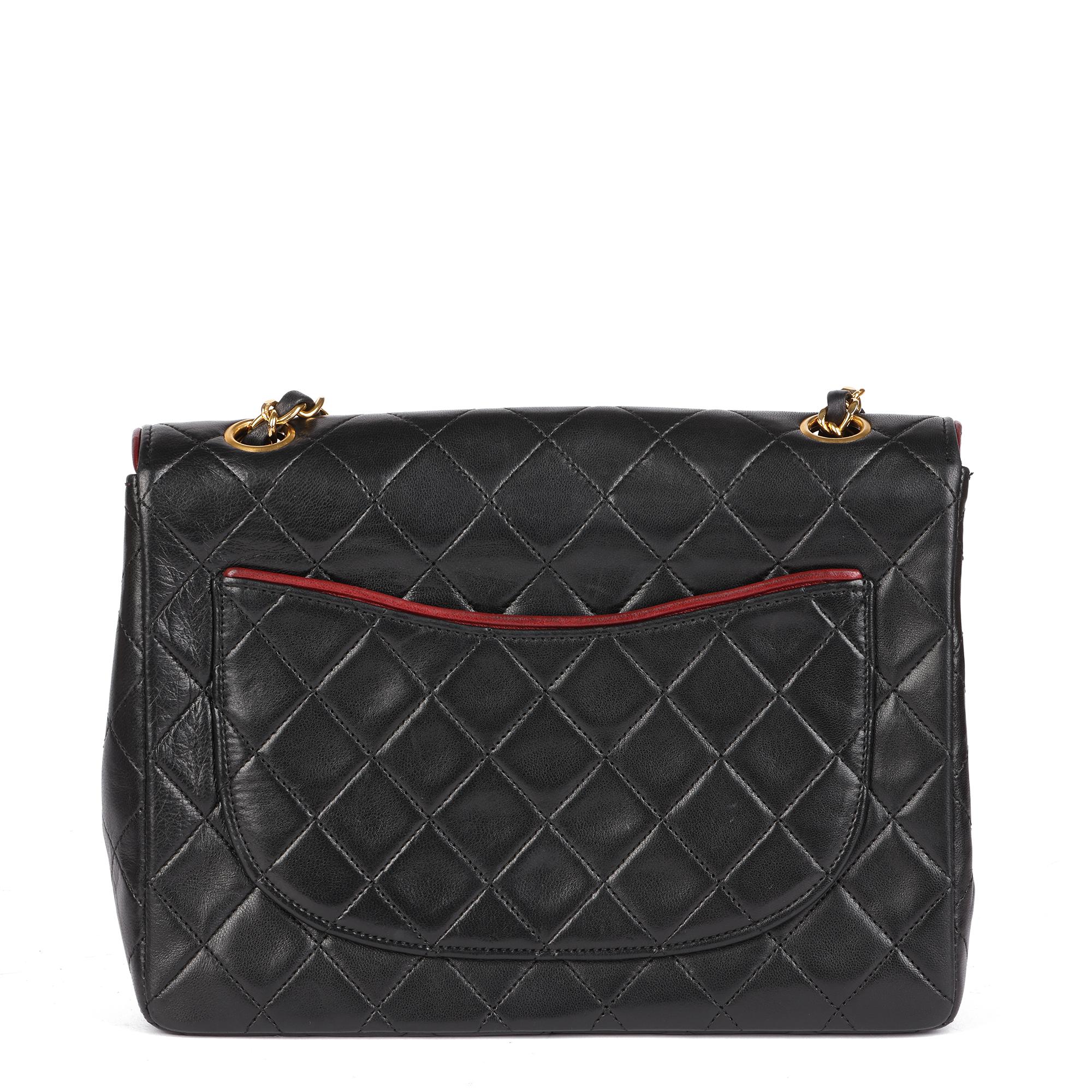 CHANEL Black Quilted Lambskin Vintage Medium Classic Single Flap Bag with Red Tr In Excellent Condition For Sale In Bishop's Stortford, Hertfordshire