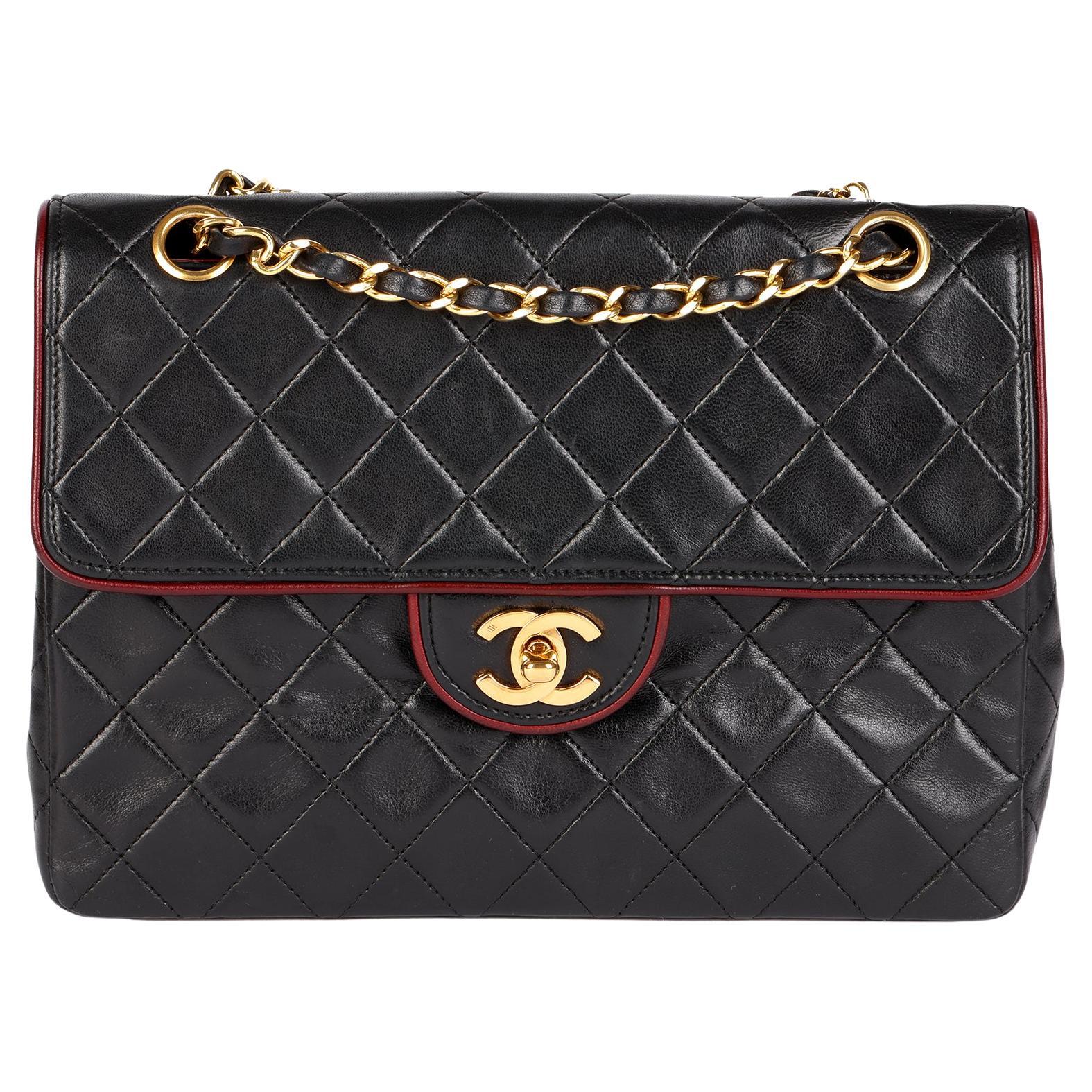 CHANEL Black Quilted Lambskin Vintage Medium Classic Single Flap Bag with Red Tr For Sale