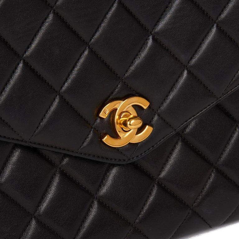 CHANEL Black Quilted Lambskin Vintage Medium Classic Top Handle Flap Bag at  1stDibs