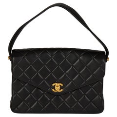 CHANEL Black Quilted Lambskin Vintage Medium Classic Top Handle Flap Bag