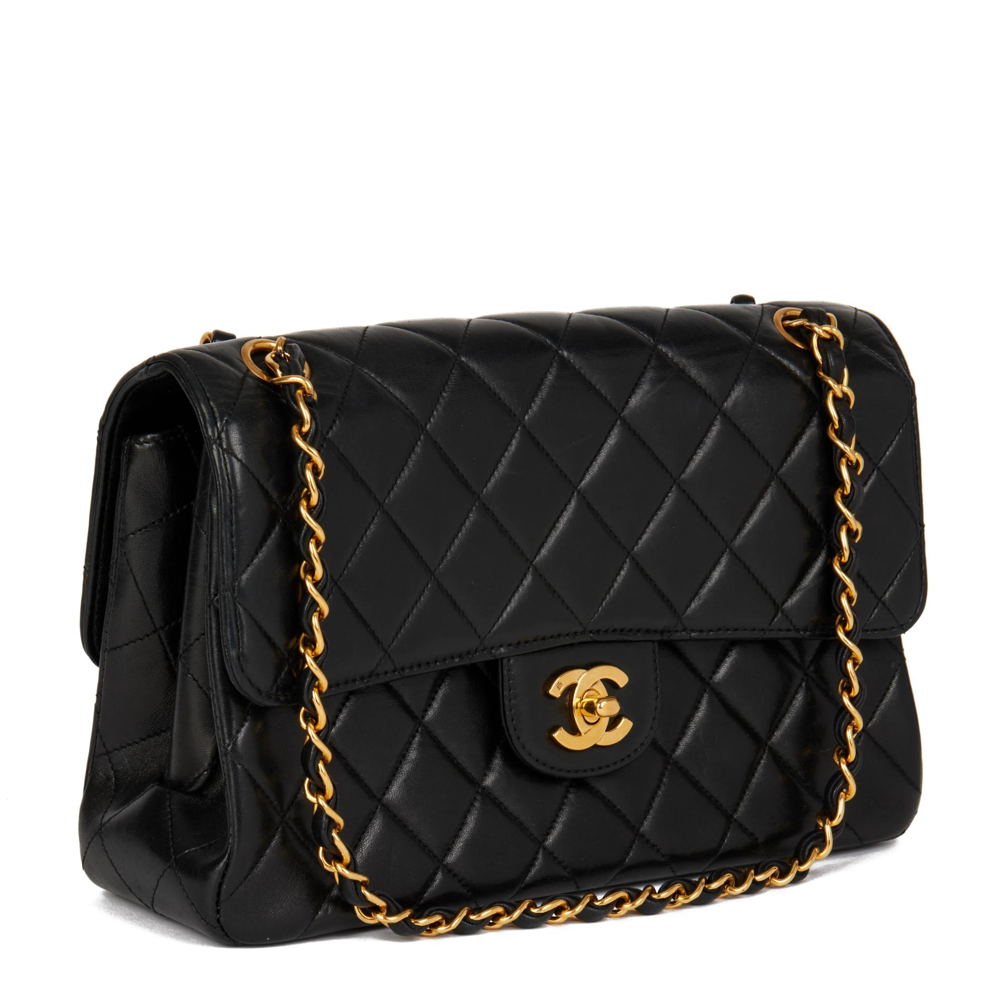 CHANEL
Black Quilted Lambskin Vintage Medium Double Sided Classic Flap Bag

Serial Number: 4022375
Age (Circa): 1997
Authenticity Details: Serial Sticker (Made in France)
Gender: Ladies
Type: Top Handle

Colour: Black
Hardware: Gold (24k