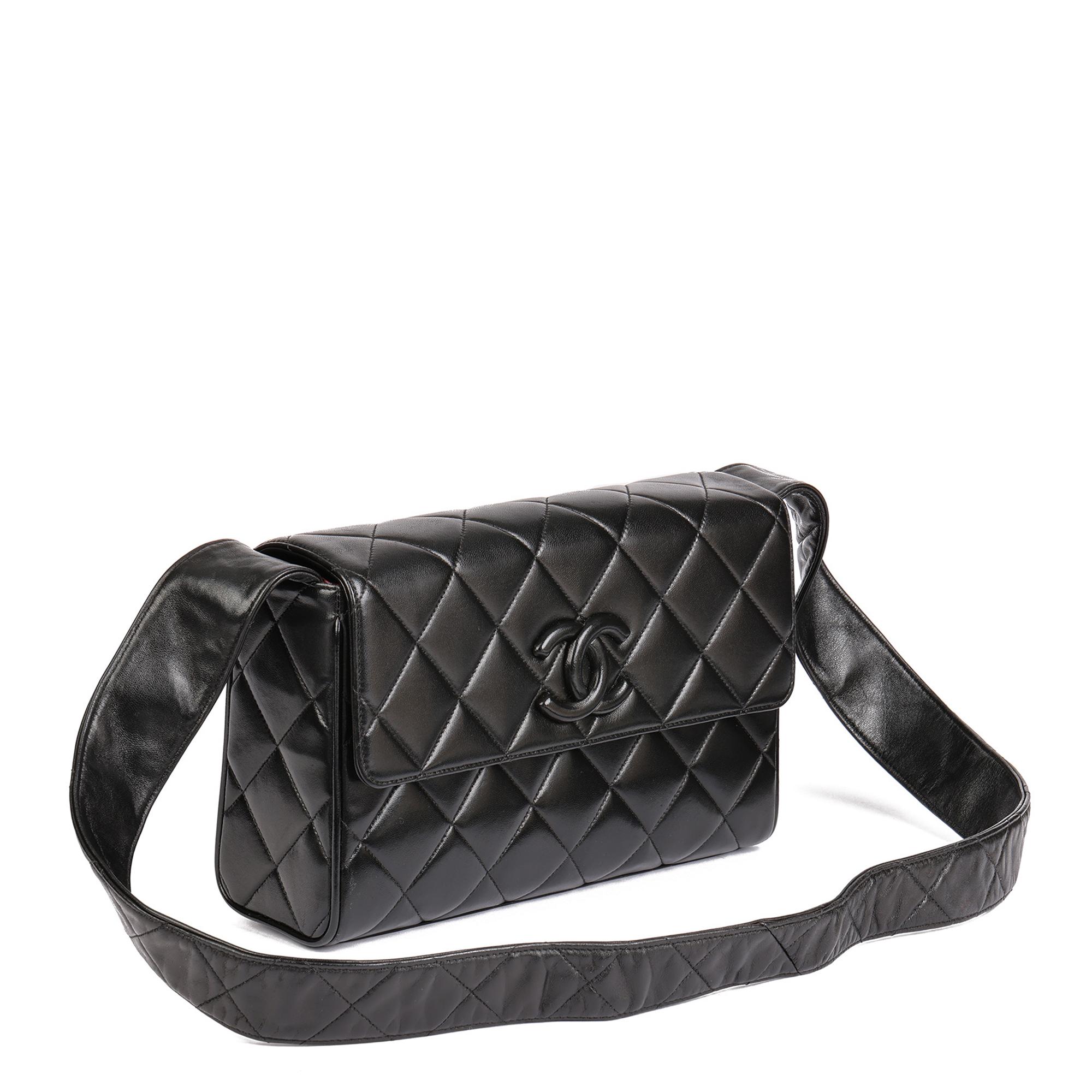 CHANEL
Black Quilted Lambskin Vintage Medium Leather Logo Flap Bag 

Serial Number: 2691885
Age (Circa): 1992
Accompanied By: Chanel Dust Bag, Authenticity Card
Authenticity Details: Authenticity Card, Serial Sticker (Made in France)
Gender: