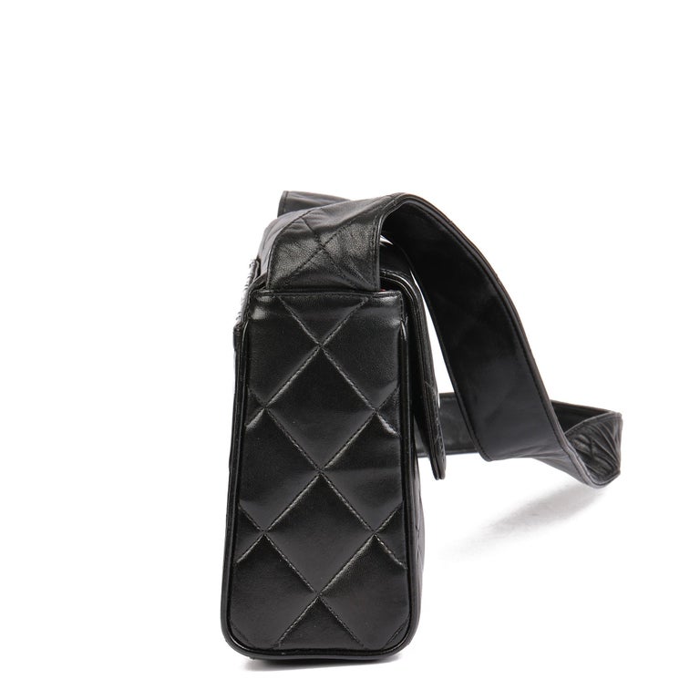 CHANEL Black Quilted Lambskin Vintage Medium Leather Logo Flap Bag