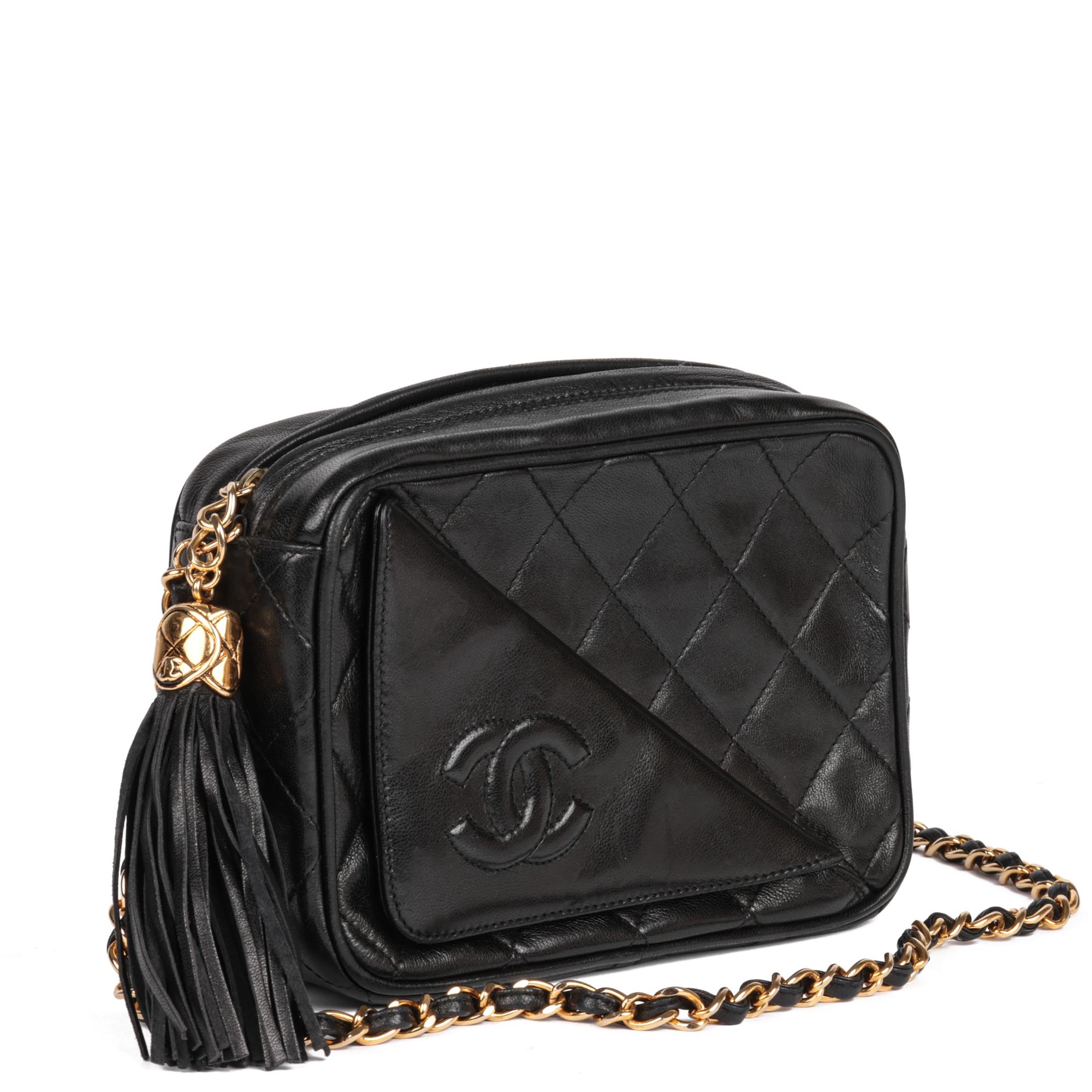 CHANEL
Black Quilted Lambskin Vintage Mini Fringe Timeless Camera Bag

Xupes Reference: HB5237
Serial Number: 1548928
Age (Circa): 1990
Accompanied By: Chanel Dust Bag, Authenticity Card
Authenticity Details: Authenticity Card, Serial Sticker (Made