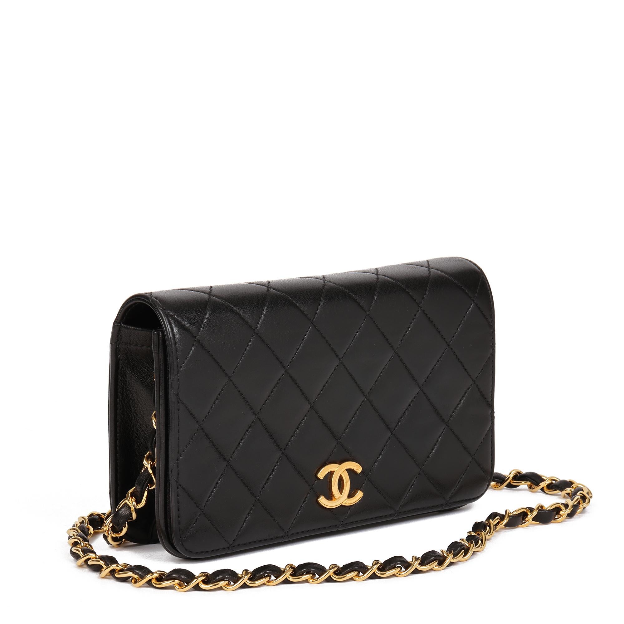 CHANEL
Black Quilted Lambskin Vintage Rectangular Mini Full Flap Bag 

Xupes Reference: HB4704
Serial Number: 4919139
Age (Circa): 1997
Accompanied By: Authenticity Card
Authenticity Details: Authenticity Card, Serial Sticker (Made in