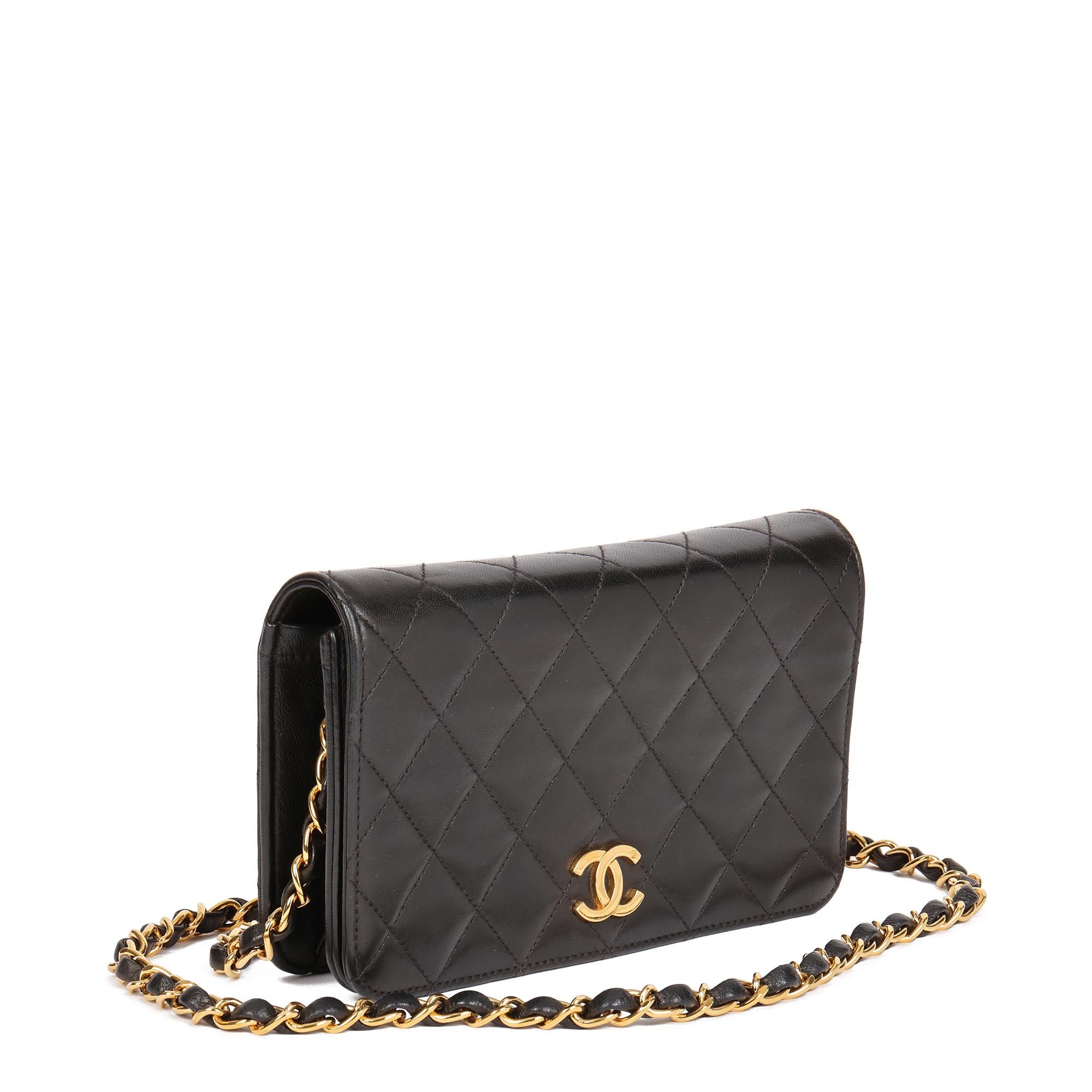 CHANEL
Black Quilted Lambskin Vintage Rectangular Mini Full Flap Bag 

Xupes Reference: HB4705
Serial Number: 5235567
Age (Circa): 2002
Accompanied By: Authenticity Card
Authenticity Details: Authenticity Card, Serial Sticker (Made in