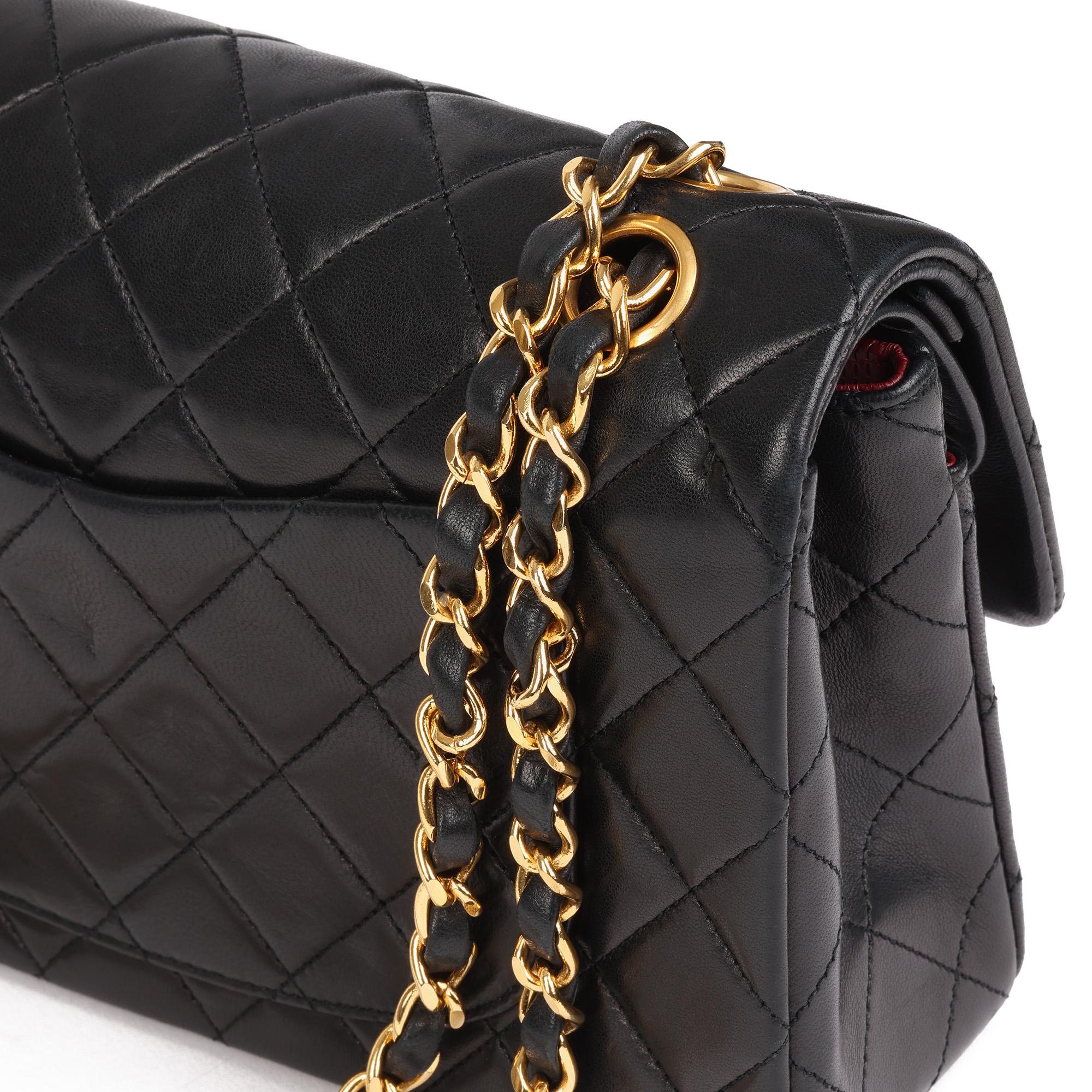 CHANEL
Black Quilted Lambskin Vintage Small Classic Double Flap Bag 

Xupes Reference: HB4030
Serial Number: 1409902
Age (Circa): 1991
Accompanied By: Chanel Dust Bag, Authenticity Card
Authenticity Details: Authenticity Card, Serial Sticker (Made