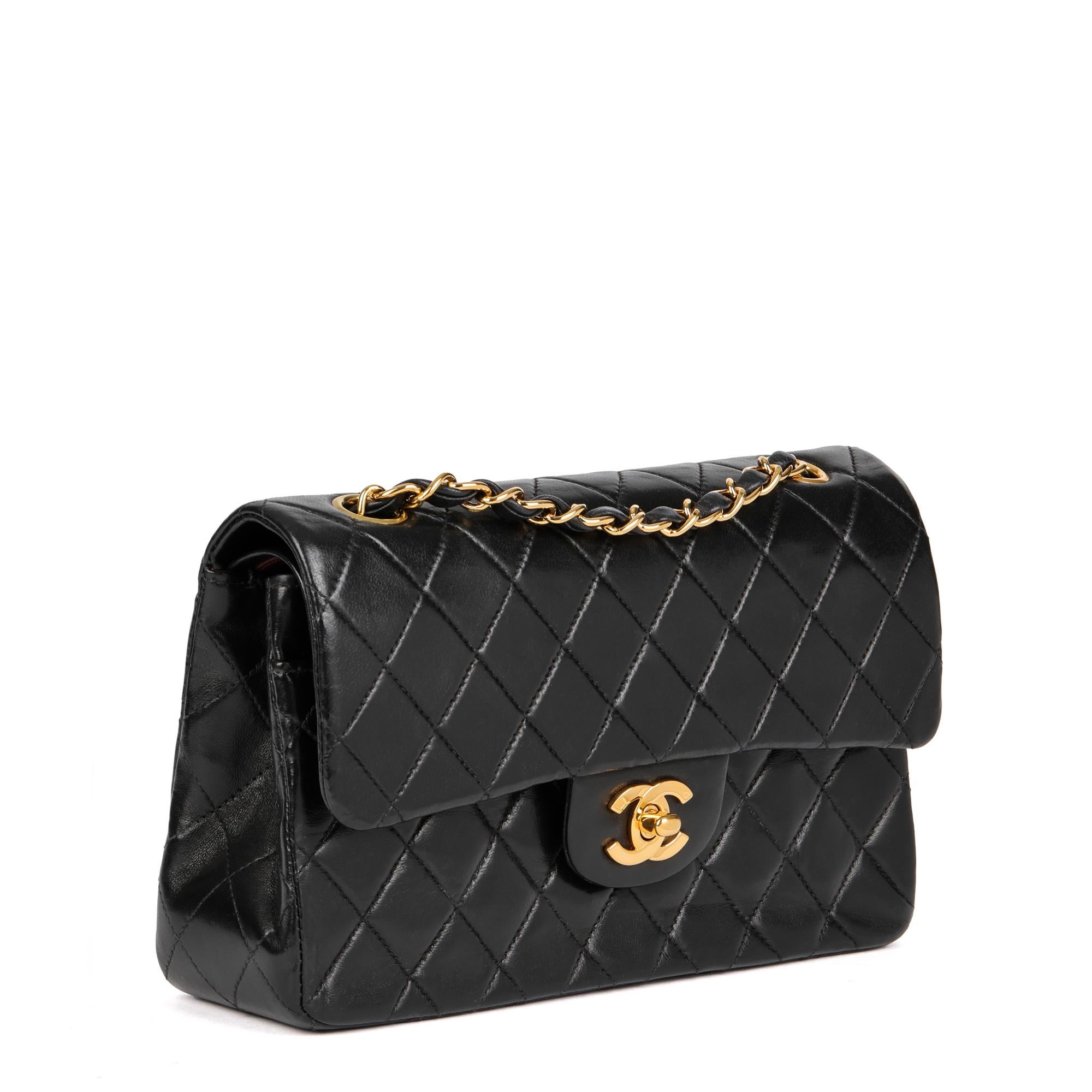 CHANEL
Black Quilted Lambskin Vintage Small Classic Double Flap Bag

Xupes Reference: HB4592
Serial Number: 7056530
Age (Circa): 2002
Accompanied By: Authenticity Card
Authenticity Details: Authenticity Card, Serial Sticker (Made in France)
Gender:
