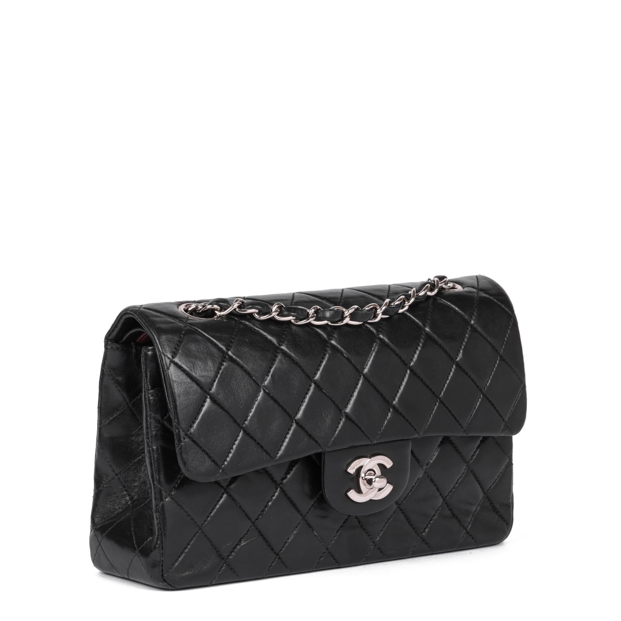 CHANEL
Black Quilted Lambskin Vintage Small Classic Double Flap Bag

Serial Number: 6688783
Age (Circa): 2001
Accompanied By: Chanel Dust Bag, Authenticity Card, Care Booklet
Authenticity Details: Authenticity Card, Serial Sticker (Made in