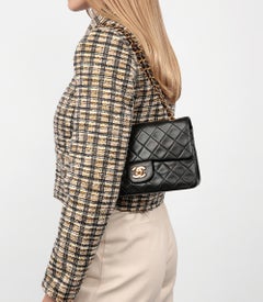 CHANEL Petit sac à double rabat classique vintage en cuir d'agneau matelassé noir