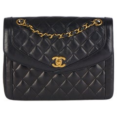 CHANEL Black Quilted Lambskin Vintage Small Classic Single Flap Bag