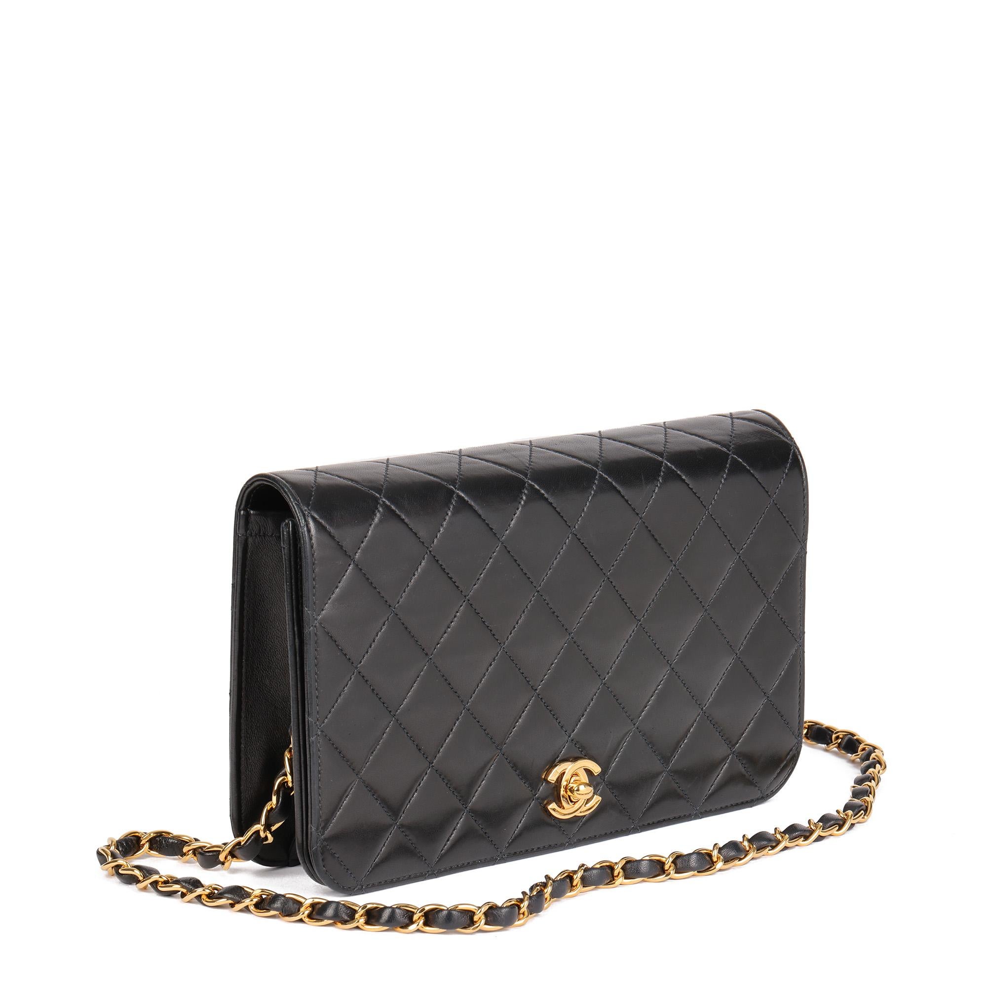 CHANEL
Black Quilted Lambskin Vintage Small Classic Single Full Flap Bag

Xupes Reference: HB4618
Serial Number: 7438256
Age (Circa): 2002
Accompanied By: Authenticity Card
Authenticity Details: Authenticity Card, Serial Sticker (Made in