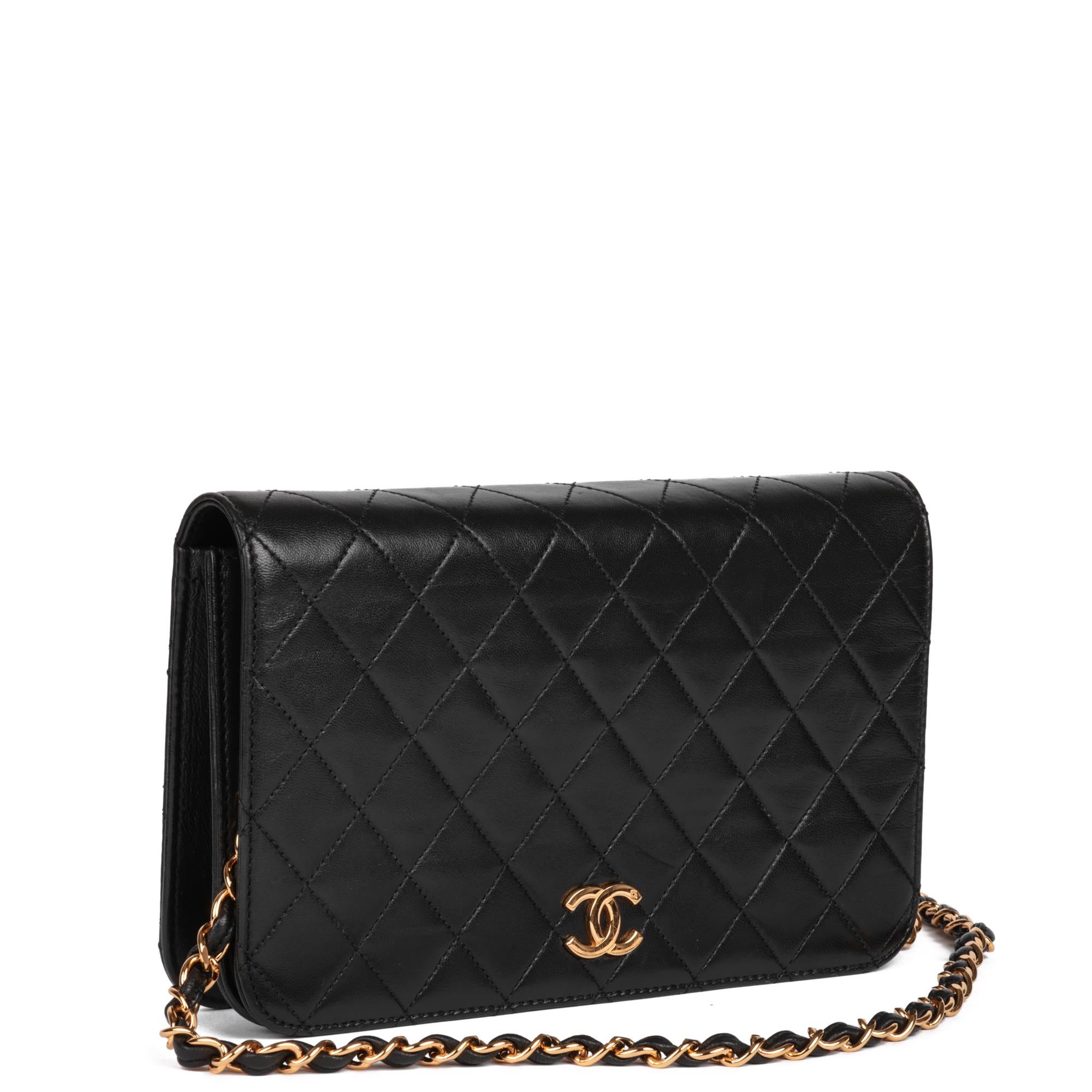 CHANEL
Black Quilted Lambskin Vintage Small Classic Single Full Flap Bag

Xupes Reference: HB5059
Serial Number: 5154939
Age (Circa): 1997
Accompanied By: Chanel Dust Bag, Box, Protective Felt, Authenticity Card
Authenticity Details: Authenticity