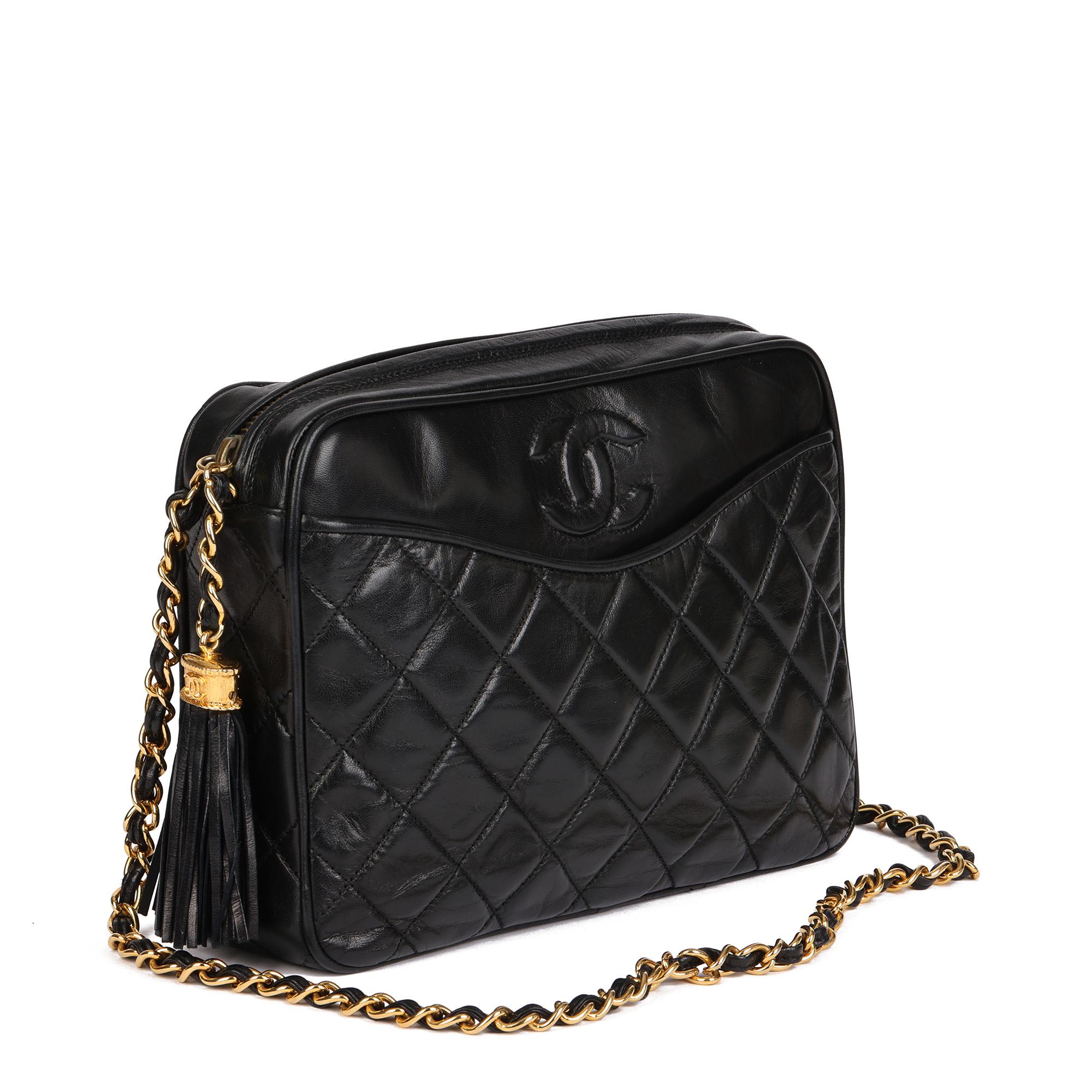 CHANEL
Black Quilted Lambskin Vintage Small Fringe Timeless Camera Bag

Serial Number: 0527905
Age (Circa): 1987
Accompanied By: Chanel Dust Bag, Authenticity Card
Authenticity Details: Authenticity Card, Serial Sticker (Made in Italy)
Gender: