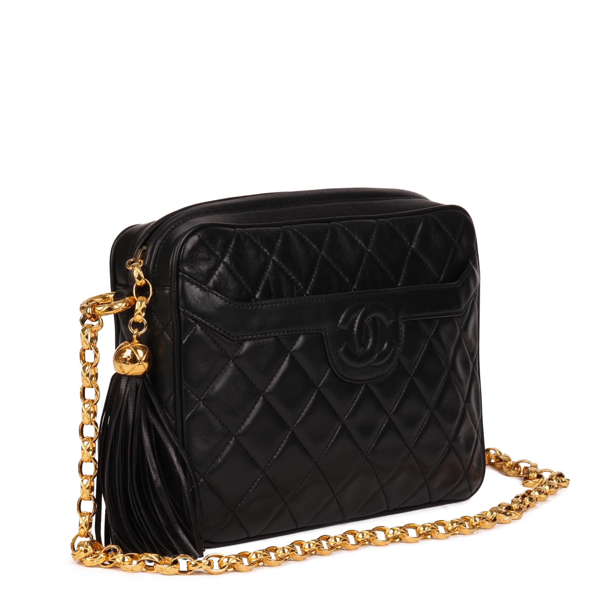 CHANEL
Black Quilted Lambskin Vintage Small Timeless Fringe Camera Bag

Xupes Reference: HB4255
Serial Number: 1995570
Age (Circa): 1991
Accompanied By: Chanel Dust Bag, Authenticity Card
Authenticity Details: Authenticity Card, Serial Sticker (Made
