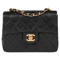 CHANEL Black Quilted Lambskin Vintage Square Mini Flap Bag