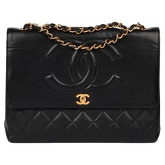 Chanel Noir Cuir d'agneau matelassé Vintage Timeless Maxi Jumbo Classic Flap Bag
