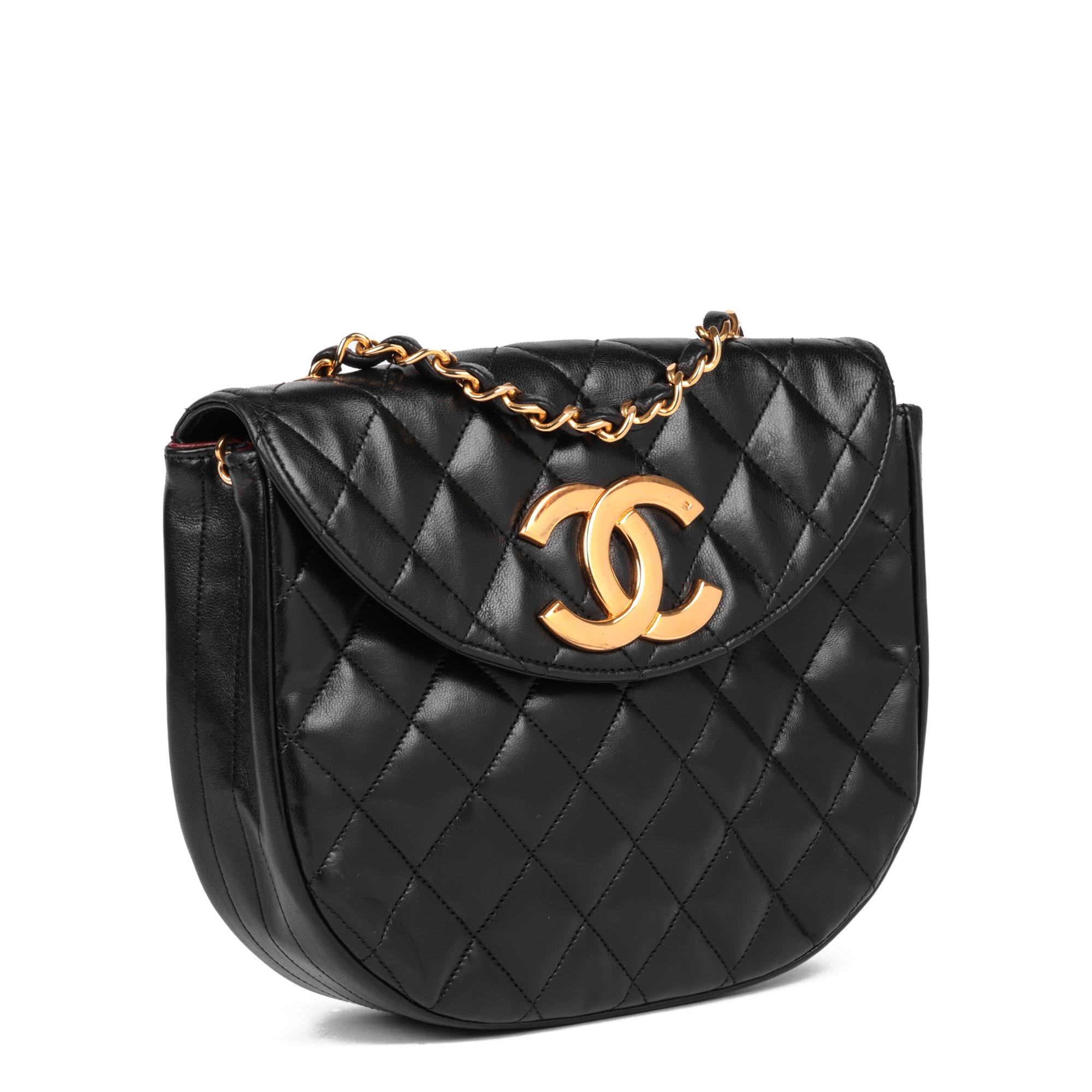 CHANEL
Black Quilted Lambskin Vintage XL Half Moon Mini Flap Bag

Serial Number: 0771433
Age (Circa): 1989
Accompanied By: Chanel Dust Bag, Authenticity Card
Authenticity Details: Authenticity Card, Serial Sticker (Made in France)
Gender: