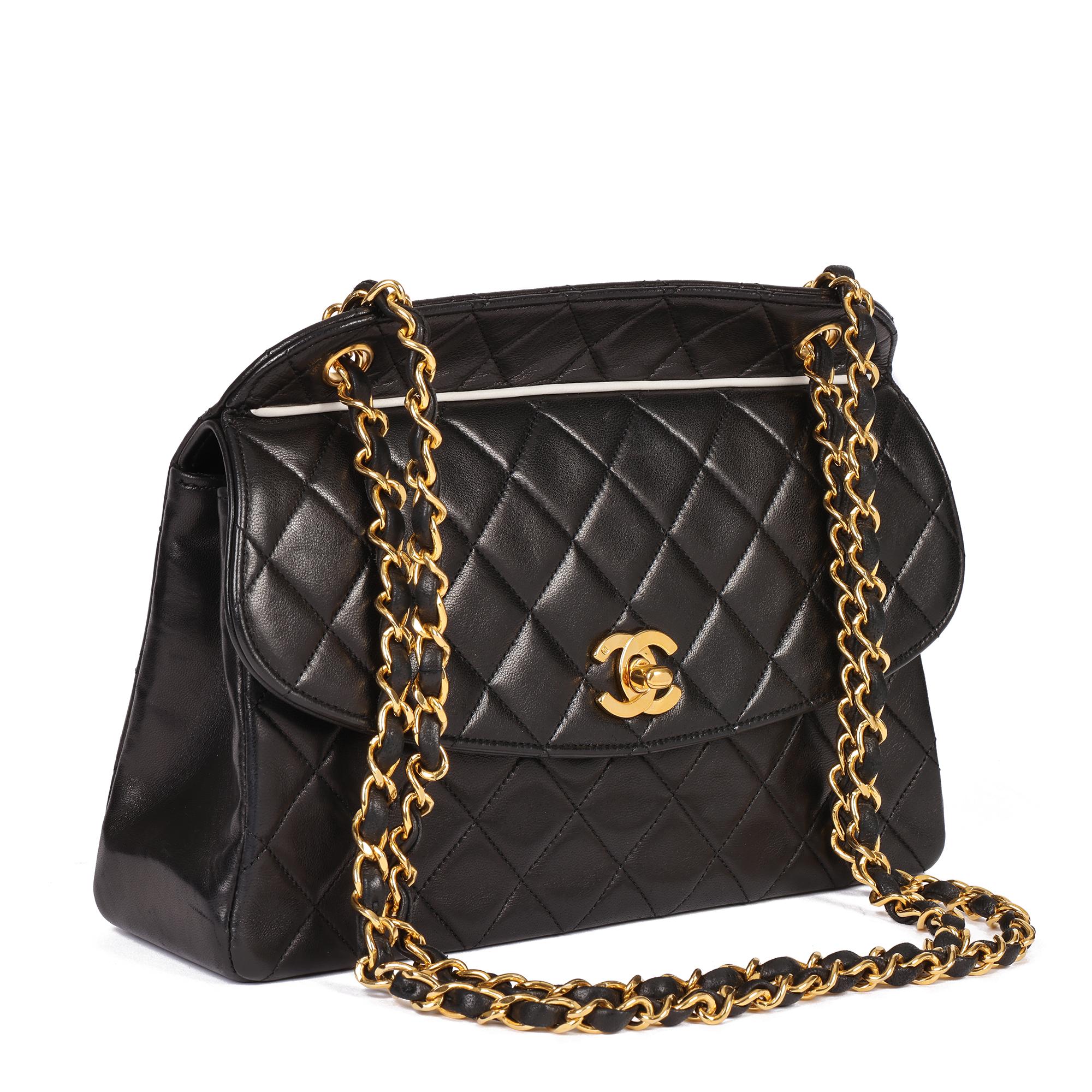 CHANEL
Black Quilted Lambskin & White Trim Vintage Medium Classic Single Flap Bag with Wallet

Xupes Reference: HB4814
Serial Number: 1510560
Age (Circa): 1990
Accompanied By: Authenticity Card, Wallet
Authenticity Details: Authenticity Card, Serial