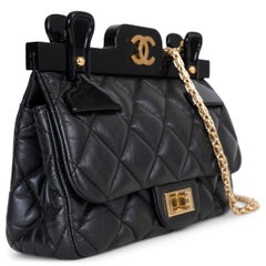 CHANEL black quilted leather 16K 2.55 REISSUE MINI HANGER FLAP Bag