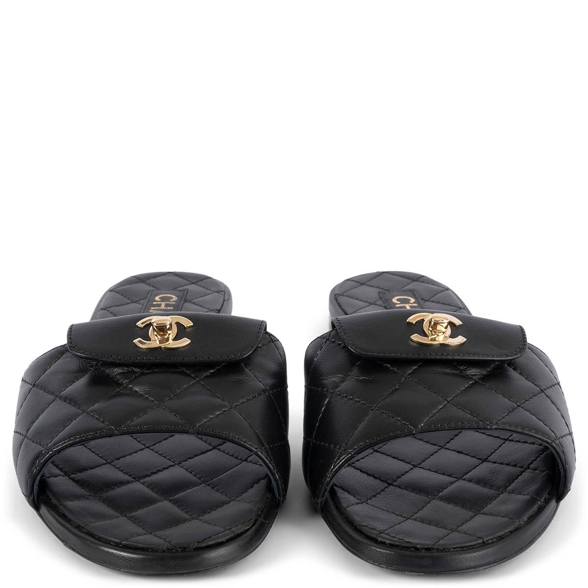 100% authentic Chanel 2022 quilted turnlock slides in black calfskin featuring light gold-tone hardware. Have been worn and are in excellent condition. 

Measurements
Model	Chanel22S G38232 X01000 94305
Imprinted Size	39C (run small)
Shoe