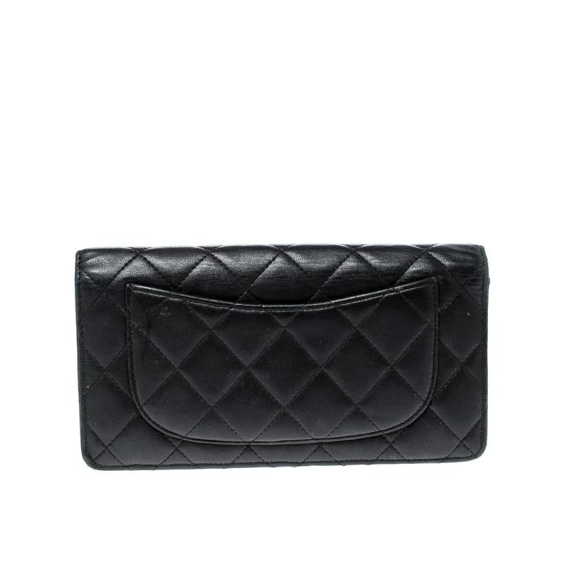 This Chanel long wallet is conveniently designed for everyday use. The wallet is crafted from quilted leather and has a leather and fabric interior that comes with multiple card slots, open compartments and a zip pocket for you to neatly arrange