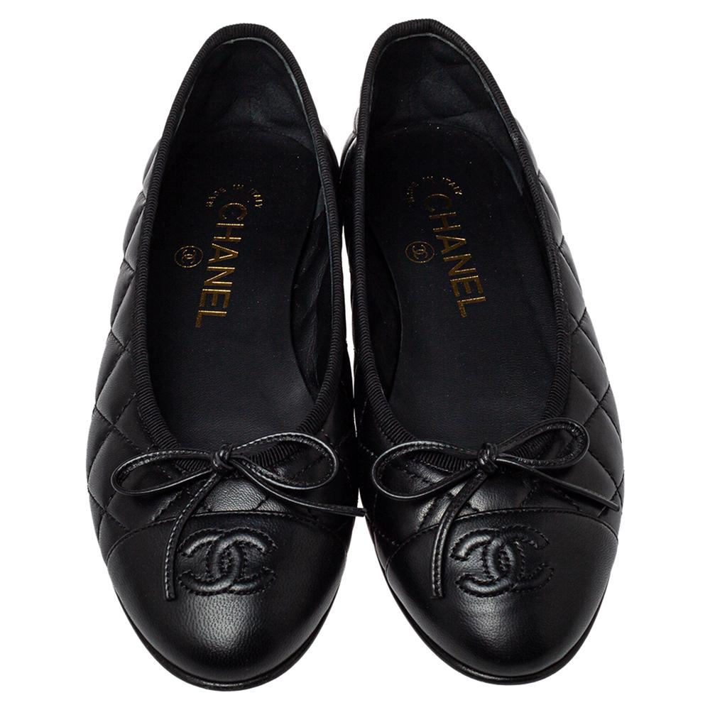 A common sight in the closets of fashionistas is a pair of Chanel ballet flats. They are perfect to wear on busy days and just stylish enough to assist one's style. These are crafted from black leather and feature little bows and the CC logo on the