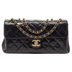 Chanel Black Quilted Leather CC Flap Bag