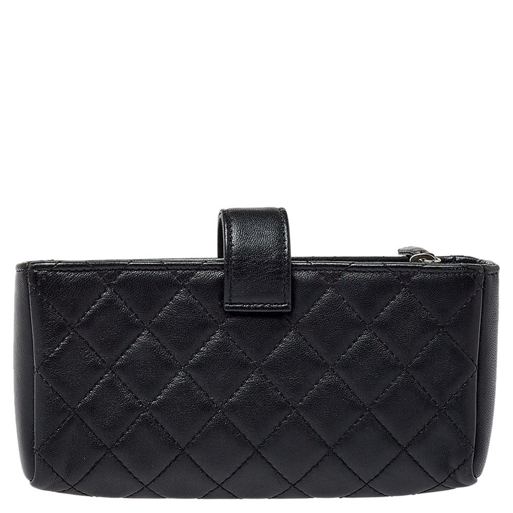 Presenting a phone holder with a fine mixture of charm and utility. This black creation from Chanel is a splendid pick. It features a leather quilted body, CC-detailed flap, and a well-sized interior to carry your phone.

Includes: Original Dustbag
