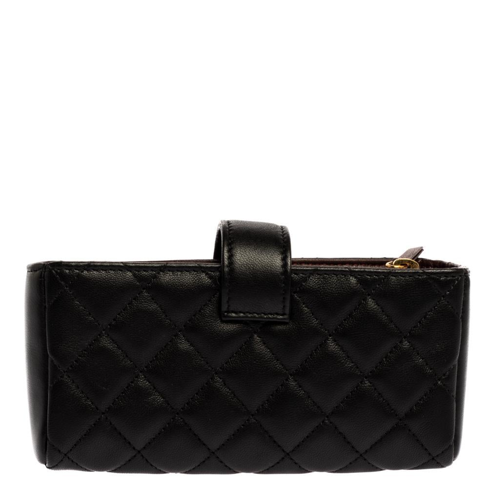 Why just stop at owning a Chanel bag when you can also carry your phone in a lovely leather clutch with the brand's signature quilt! This creation from Chanel is truly one tech accessory you will love to flaunt. It has a CC-adorned flap that reveals