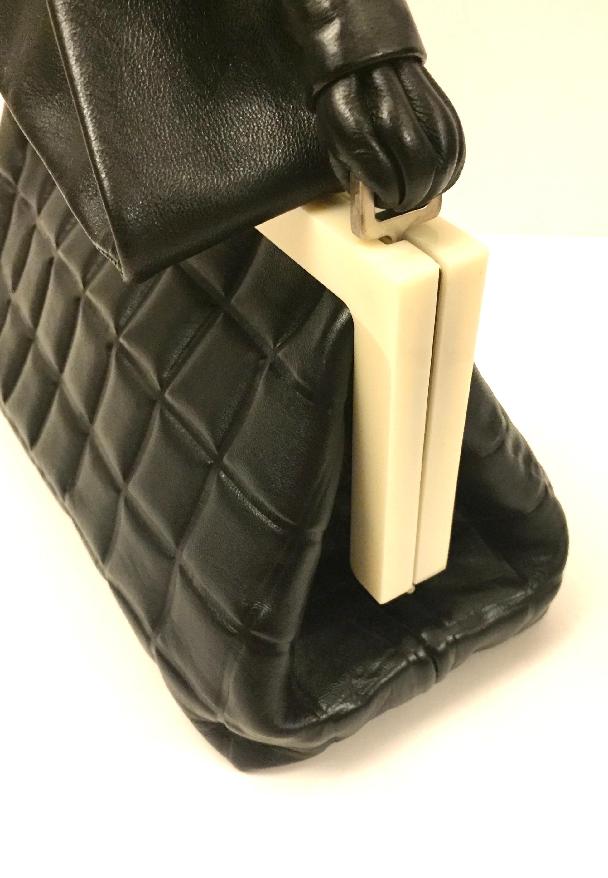 Chanel black quilted leather chocolate bar handle bag 1