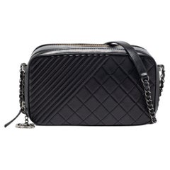 Chanel Schwarze gesteppte Coco Boy Kameratasche aus Leder