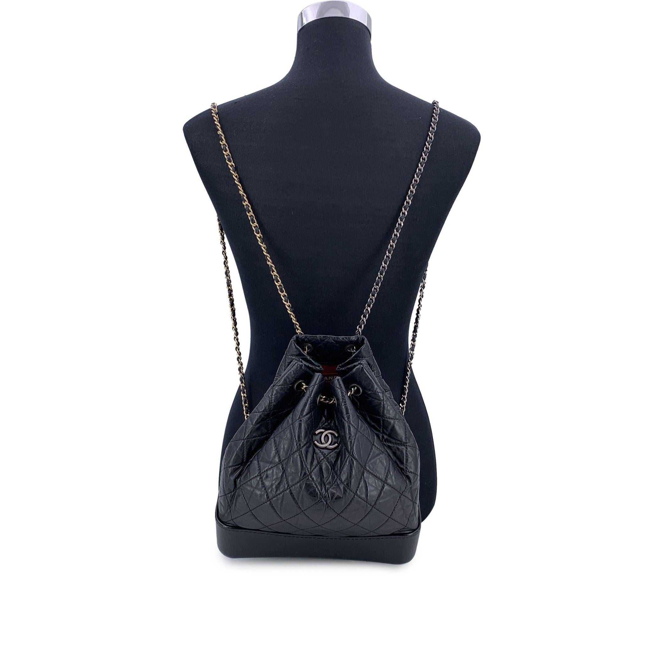 This beautiful Bag will come with a Certificate of Authenticity provided by Entrupy. The certificate will be provided at no further cost Embrace a perfect blend of style and functionality with the CHANEL aged quilted leather Gabrielle Backpack in
