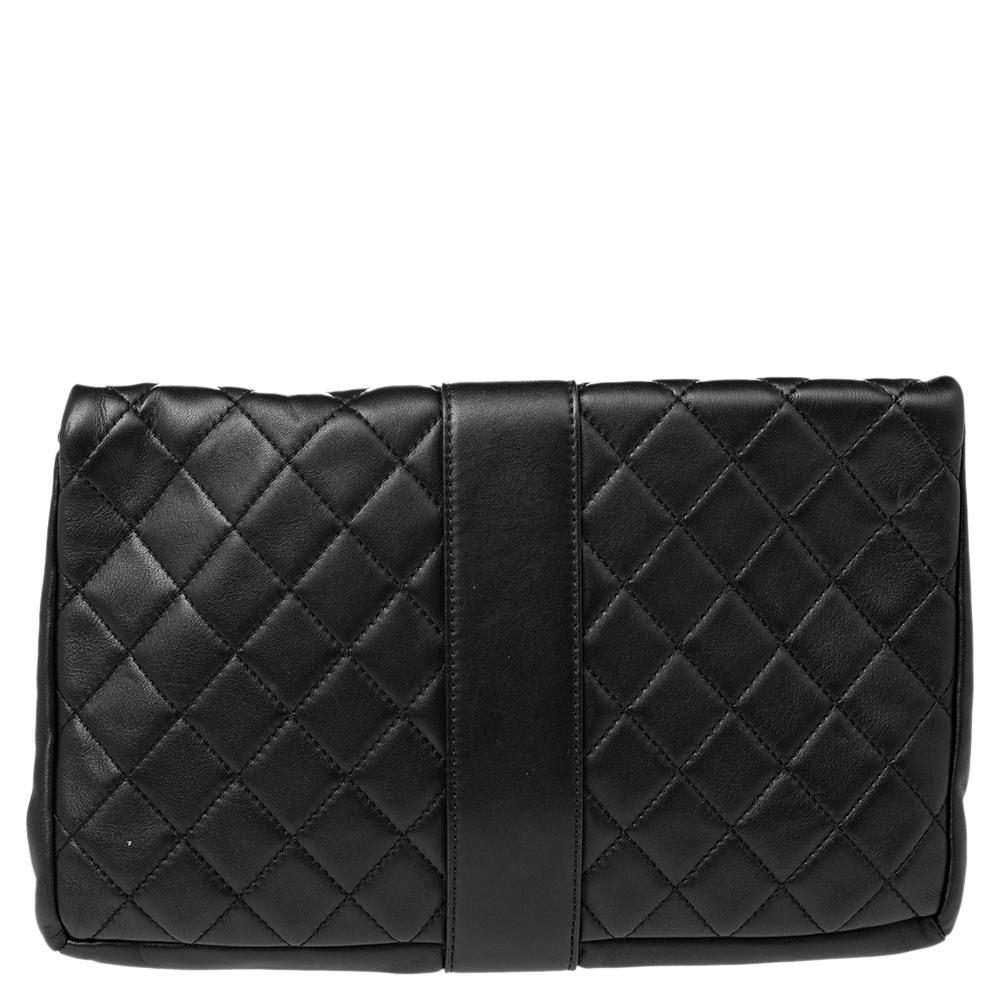 The Chanel Grip clutch, beautifully crafted using black leather, offers a classic style. It has a quilted flap secured with a belted strap, and the interior is lined with canvas.

Includes: Original Dustbag, Authenticity Card
