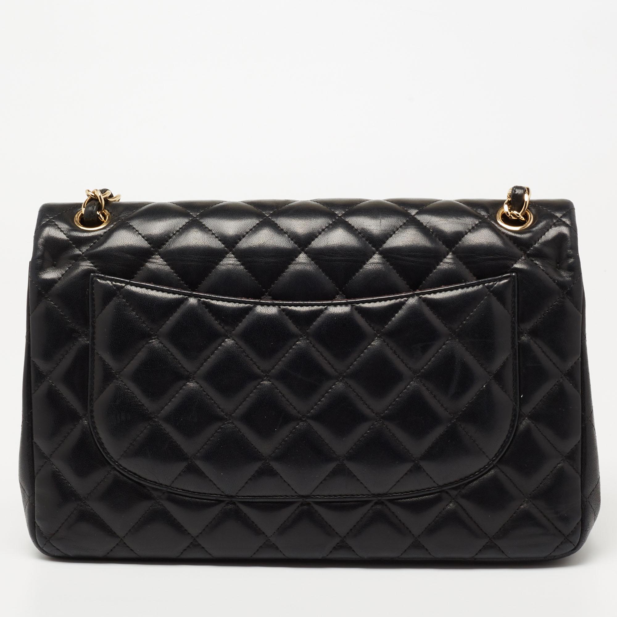 
We're bringing Chanel's iconic Classic Flap bag to your closet with this beautiful creation. Exquisitely crafted from quilted leather, it bears the signature label inside the leather interior and the iconic CC turn-lock on the flap. The Chanel bag